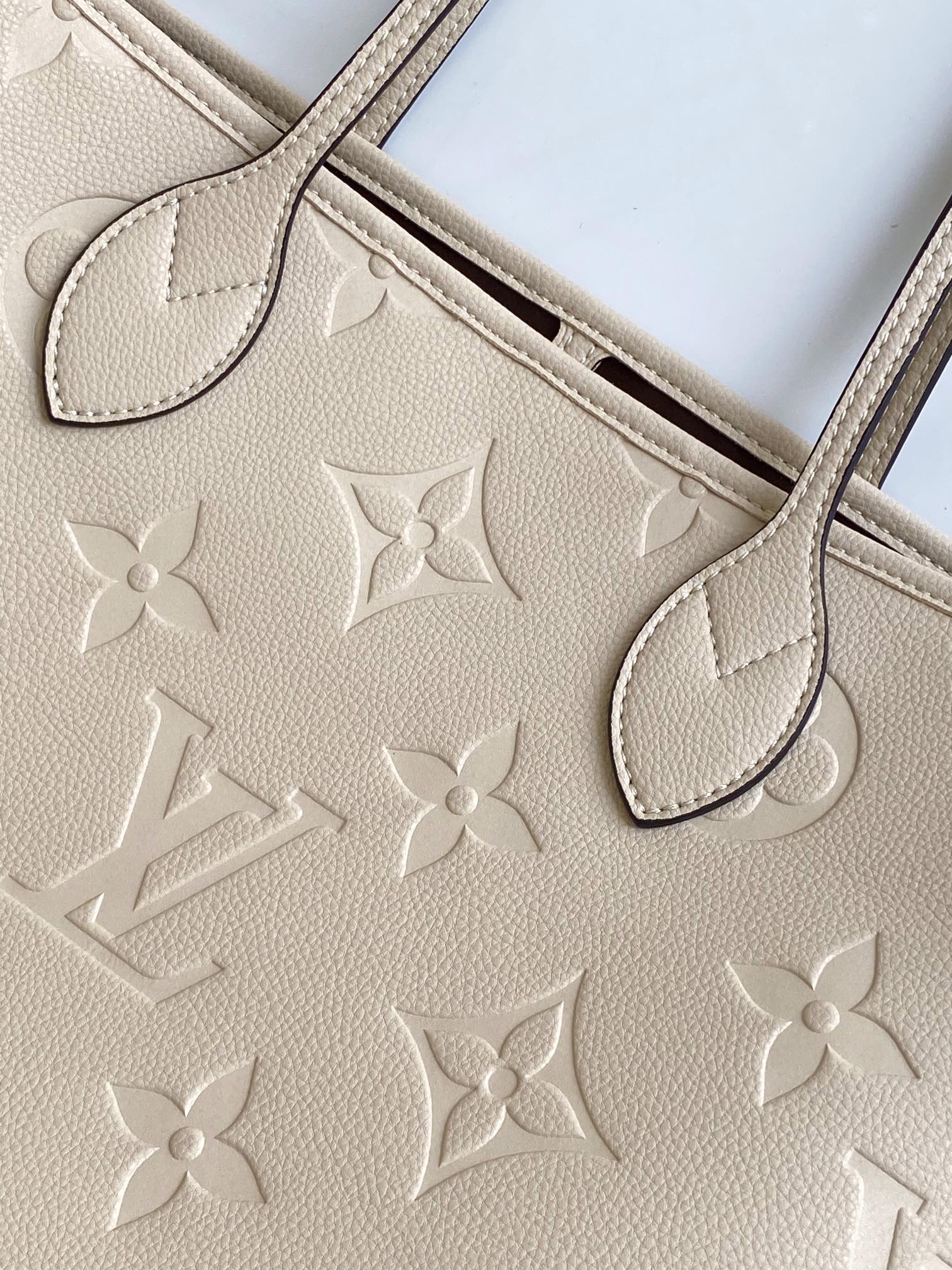 NEVERFULL MM 32 TOURTERELLE GRAY MONOGRAM EMPREINTE LEATHER