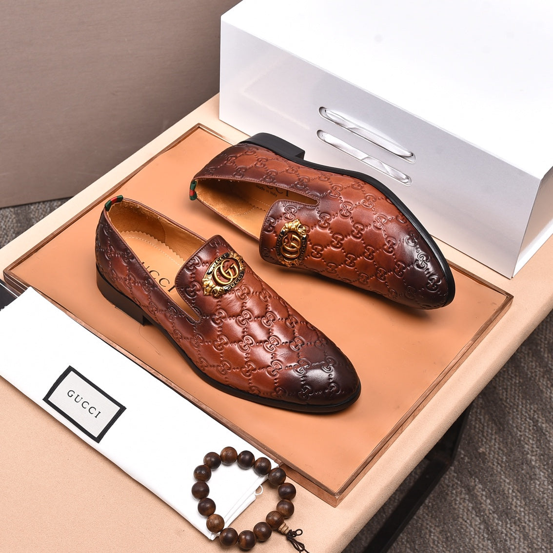 GG Men's Interlocking GG Loafer Brown Embossed Cowhide 480402