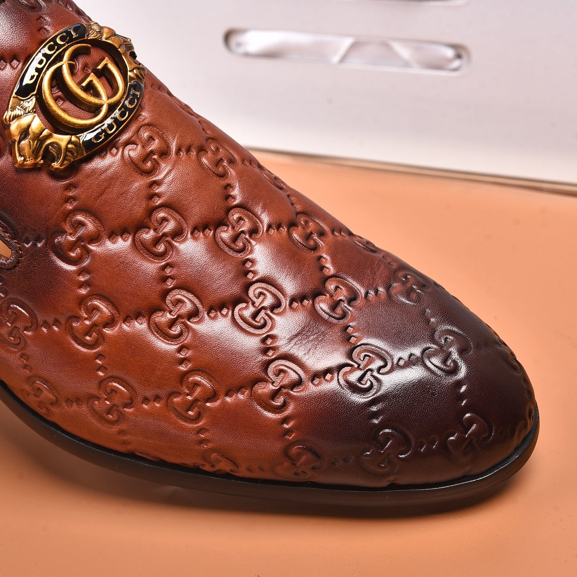 GG Men's Interlocking GG Loafer Brown Embossed Cowhide 480402