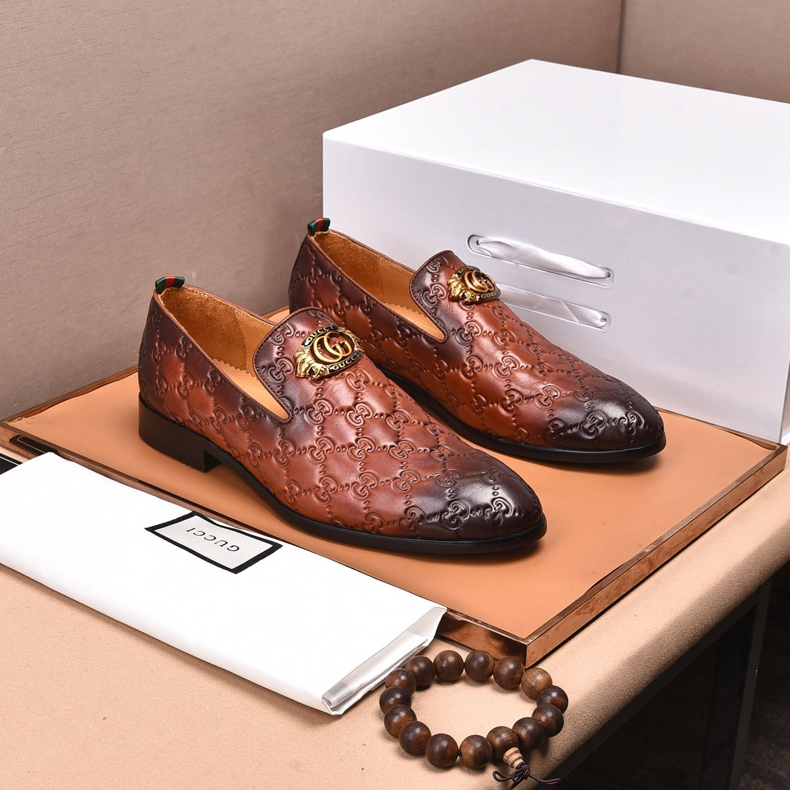 GG Men's Interlocking GG Loafer Brown Embossed Cowhide 480402