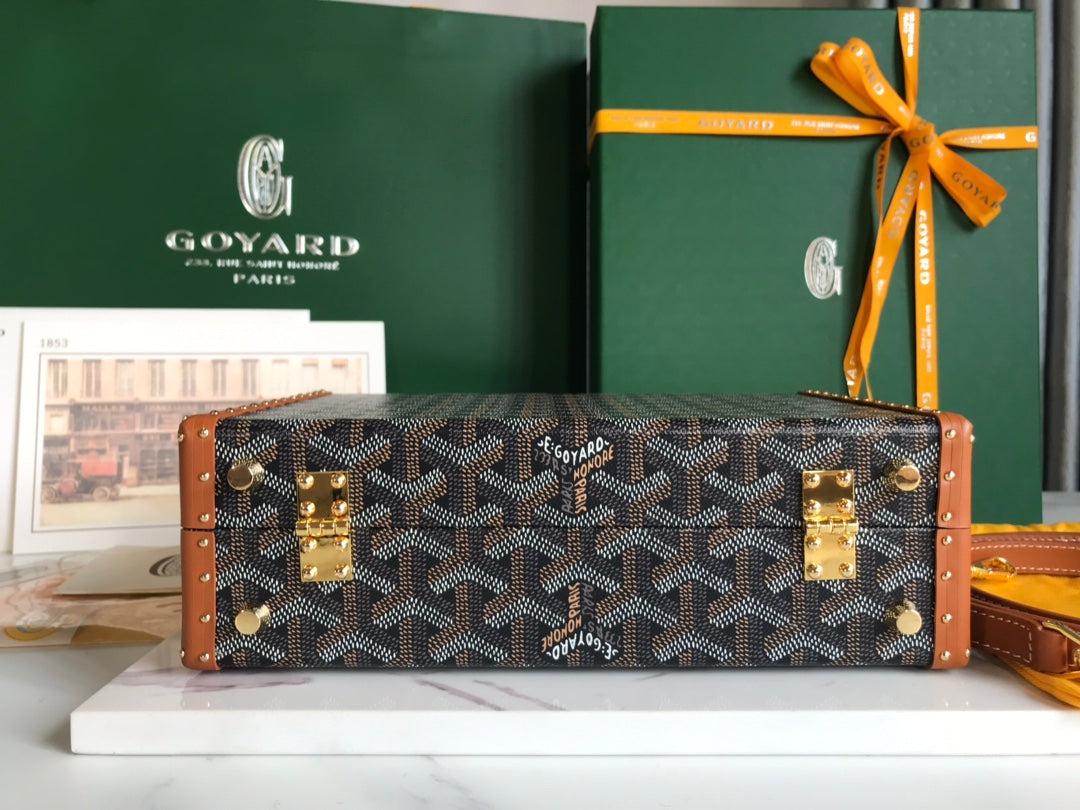 GRAND HÔTEL TRUNK BAG 24 IN BLACK GOYARDINE CANVAS AND TAN CALFSKIN