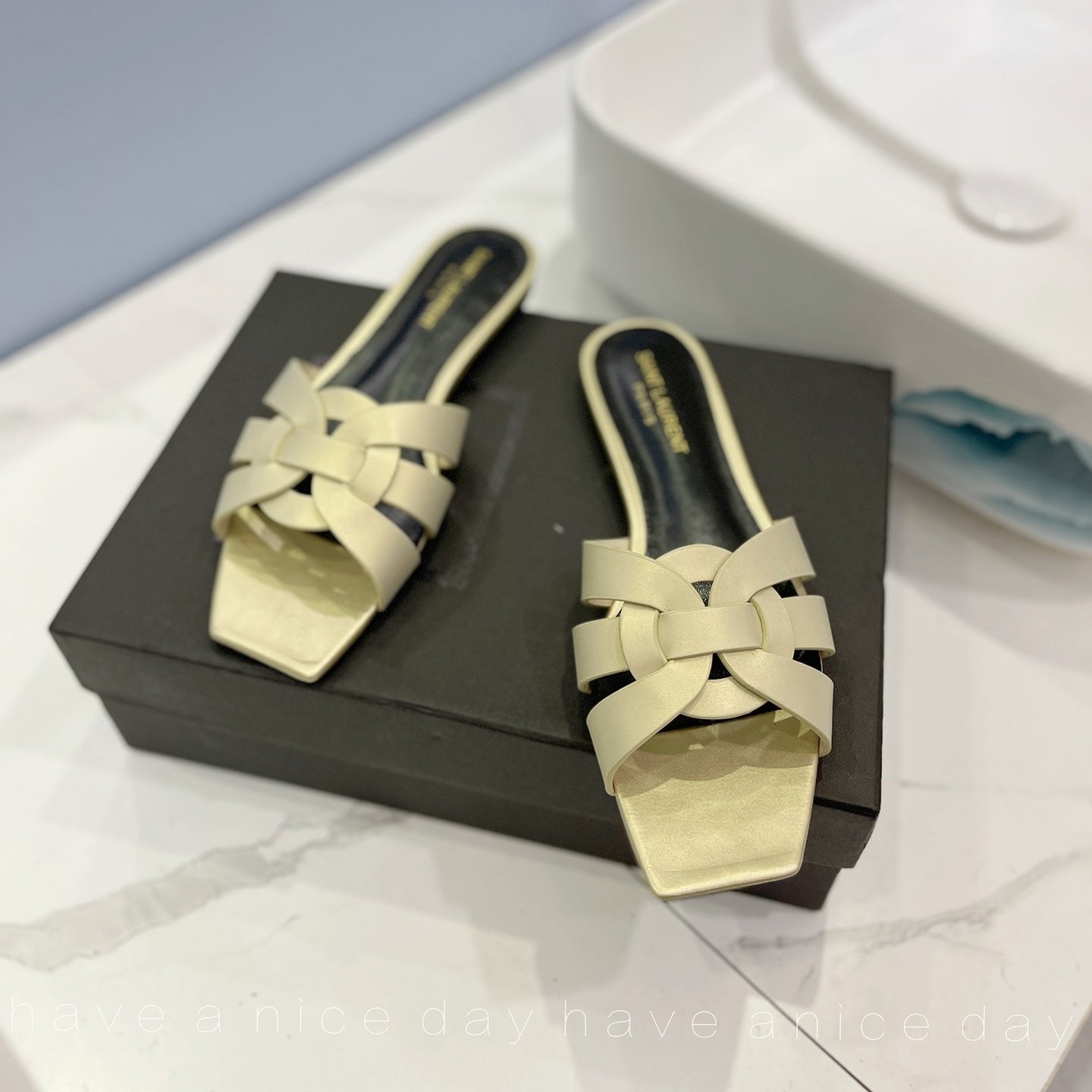 SL TRIBUTE SLIPPERS PASTEL YELLOW CALFSKIN