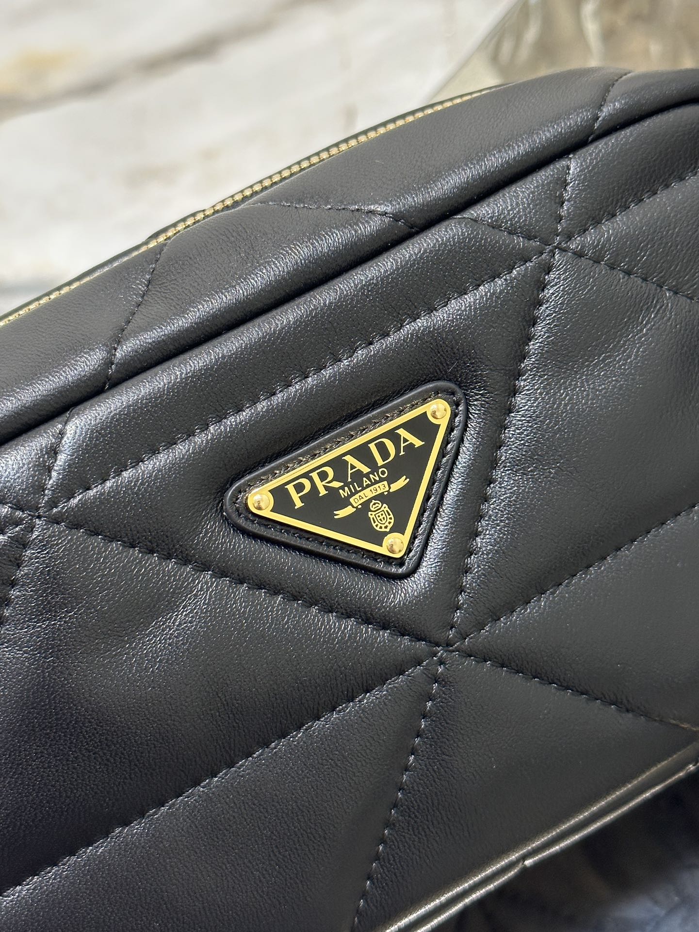 CAMERA BAG 22 IN BLACK TRIANGLE PATTERN QUILTED LAMBSKIN GOLD HARDWARE