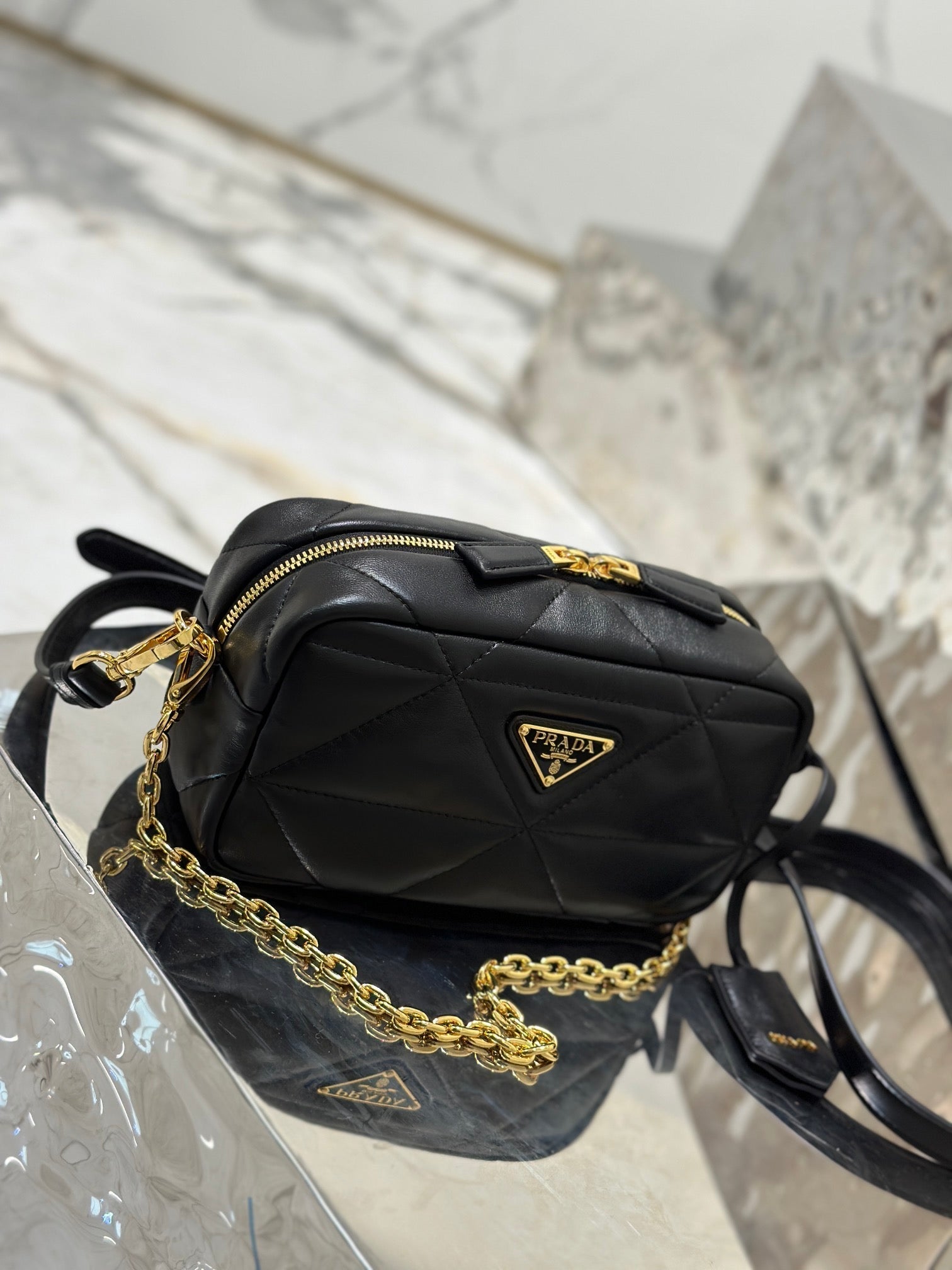 CAMERA BAG 22 IN BLACK TRIANGLE PATTERN QUILTED LAMBSKIN GOLD HARDWARE