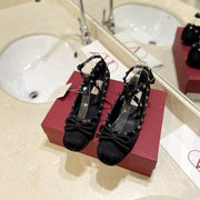 ROCKSTUD PATENT BLACK LEATHER BALLERINA