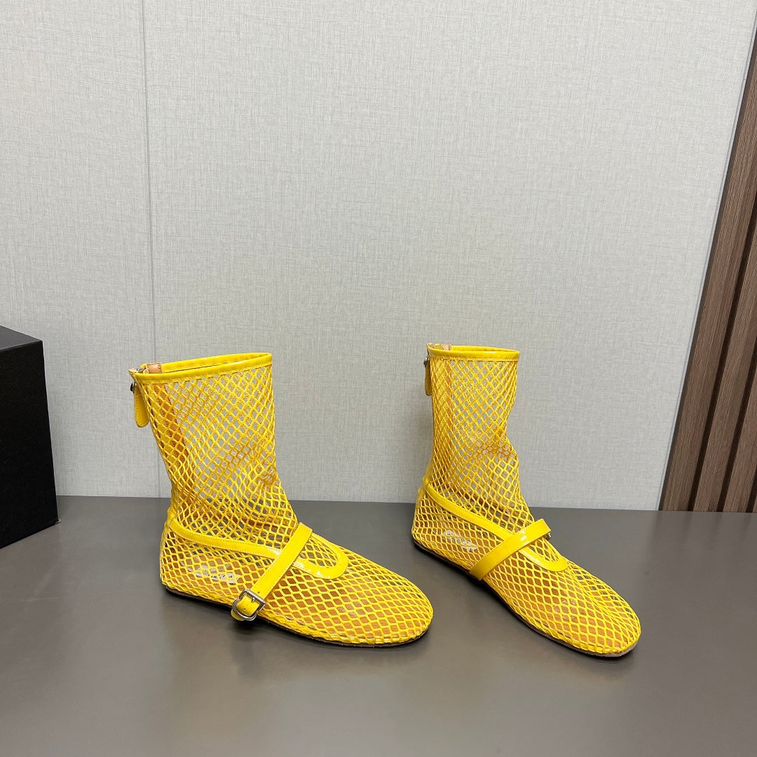 ALAIA SHORT BOOTS IN LEMON YELLOW MESH FISHNET