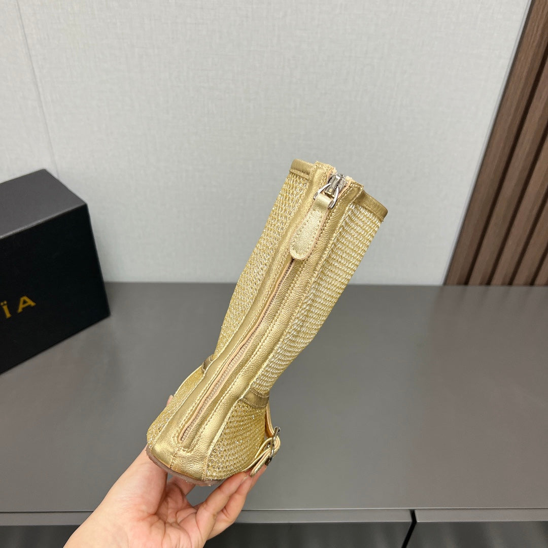 ALAIA SHORT BOOTS IN GOLD MESH FISHNET