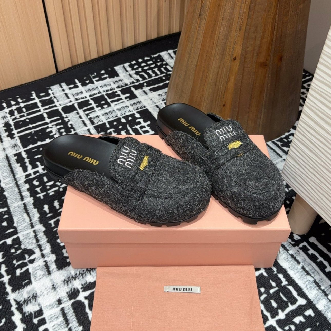 Miu slippers Black Original Wool