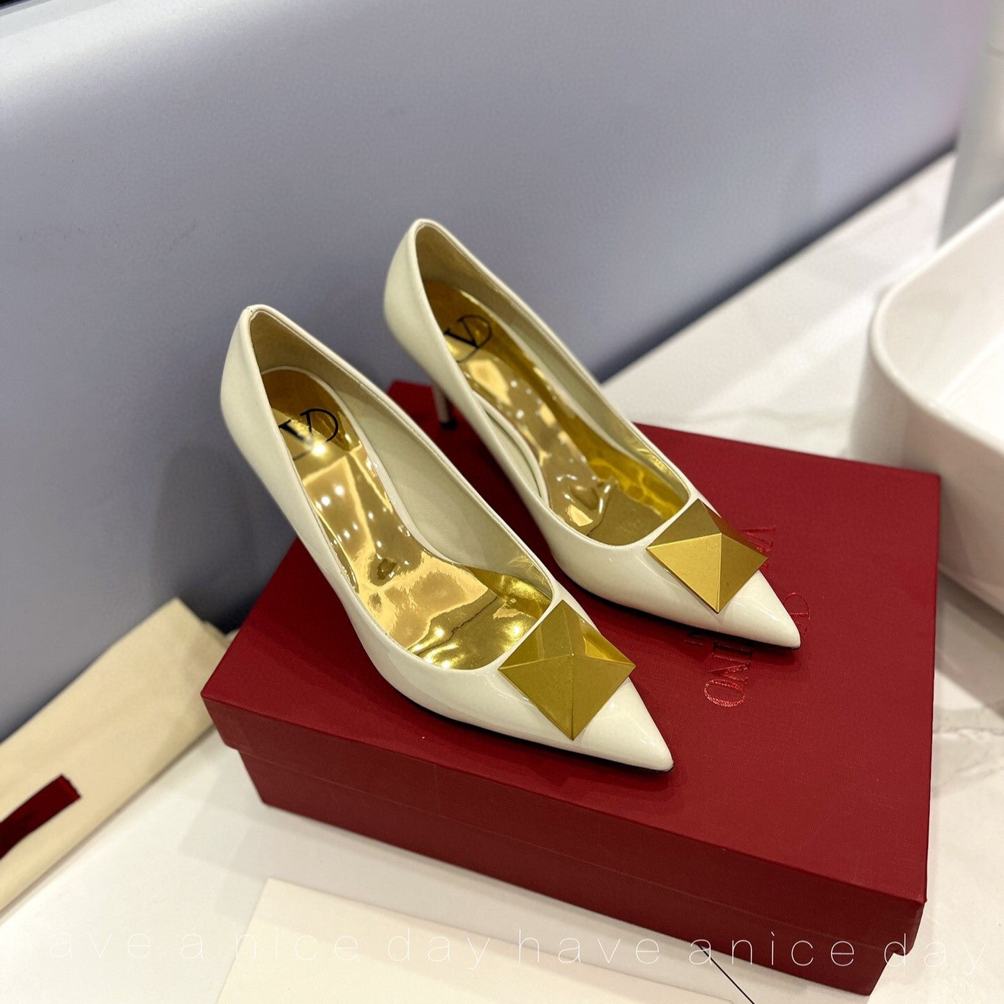 One Stud Gold Patent White Leather Pump