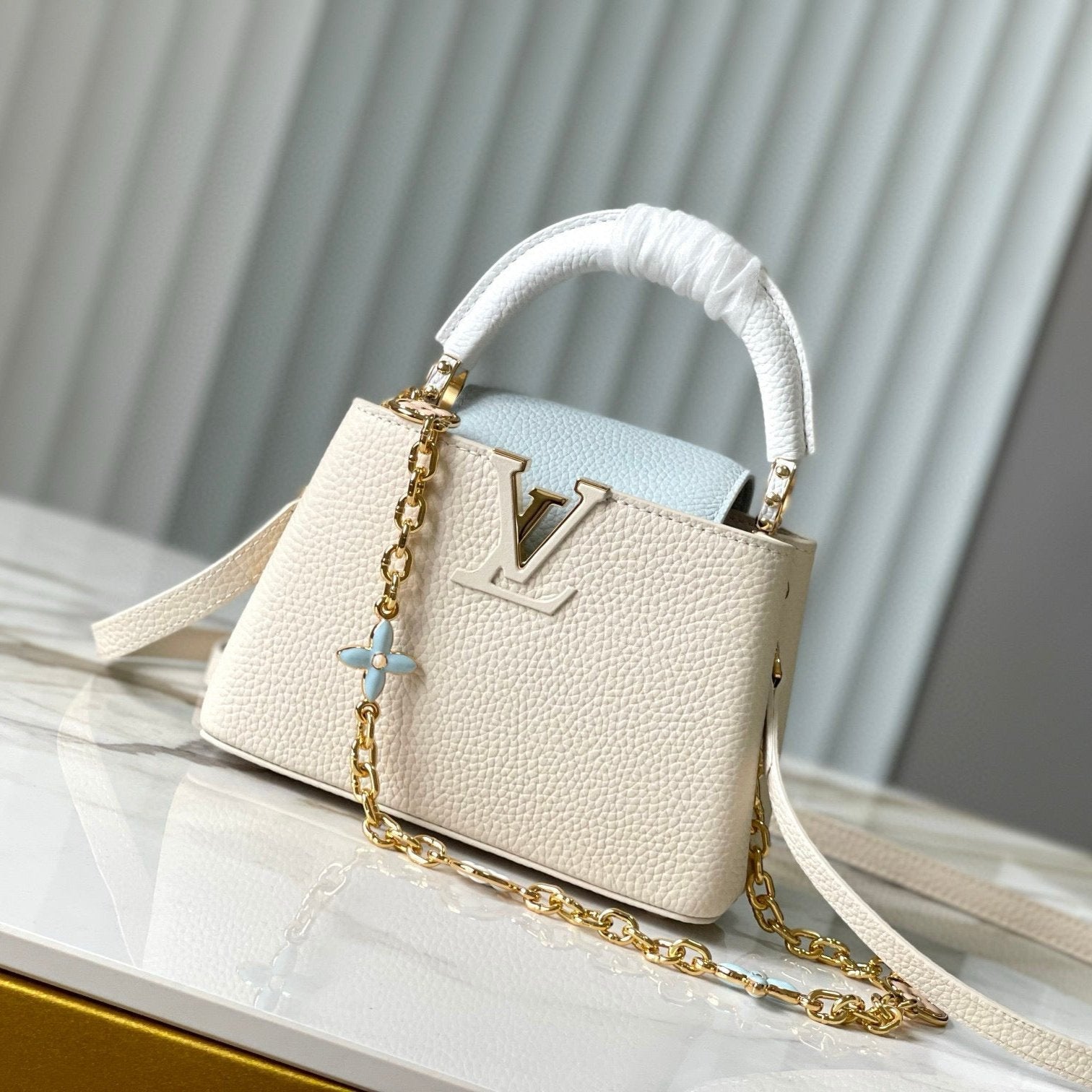 CAPUCINES MINI 21 CREAM CLOUD BLUE TAURILLON GOLD  HARDWARE