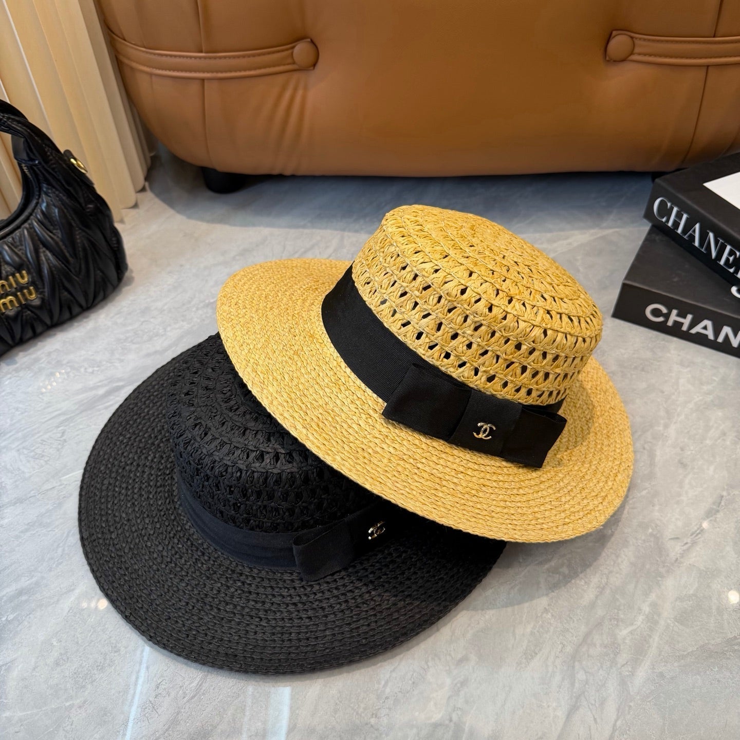 Chanel Straw Hat With Black Ribbon Accent 250043