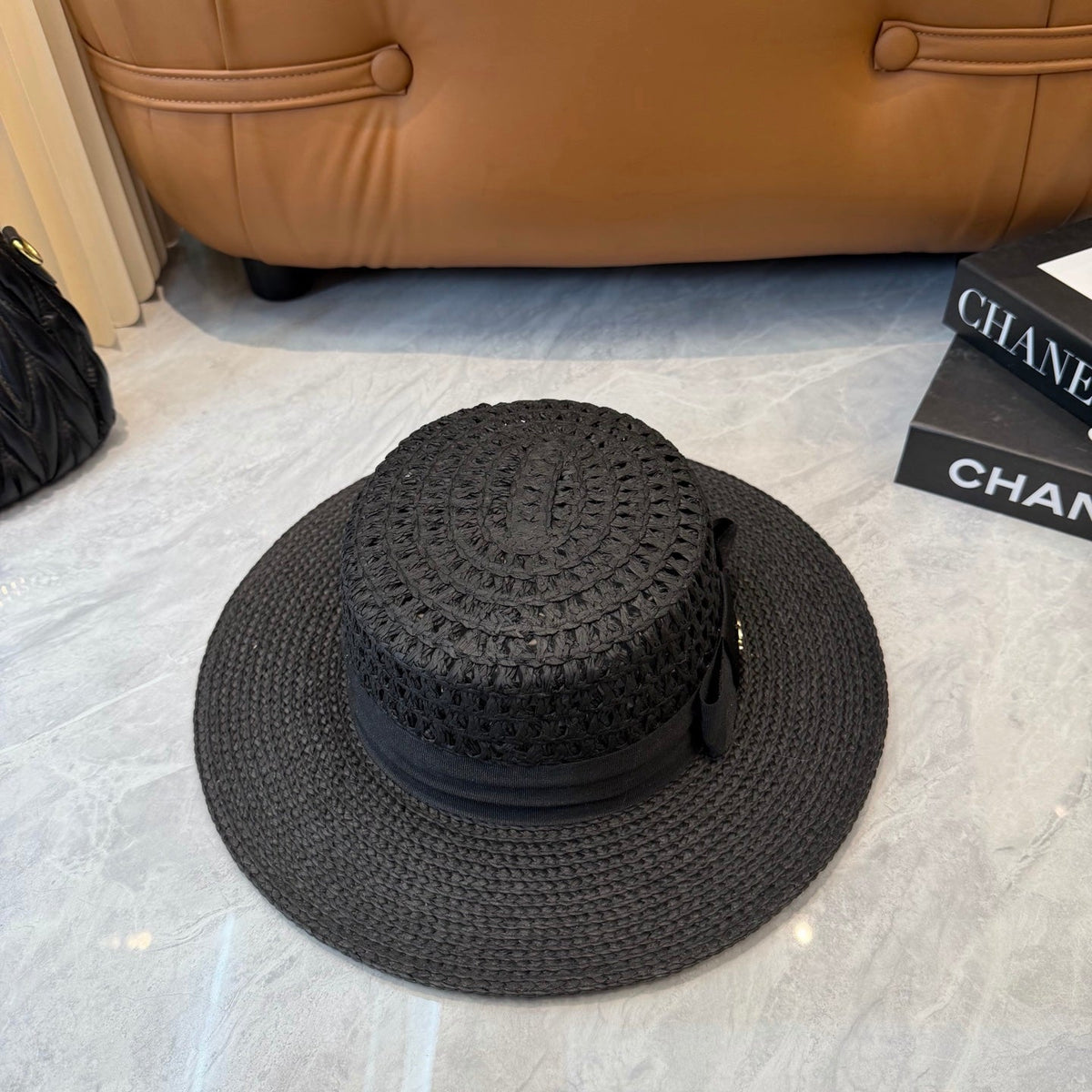 Chanel Straw Hat With Black Ribbon Accent 250043