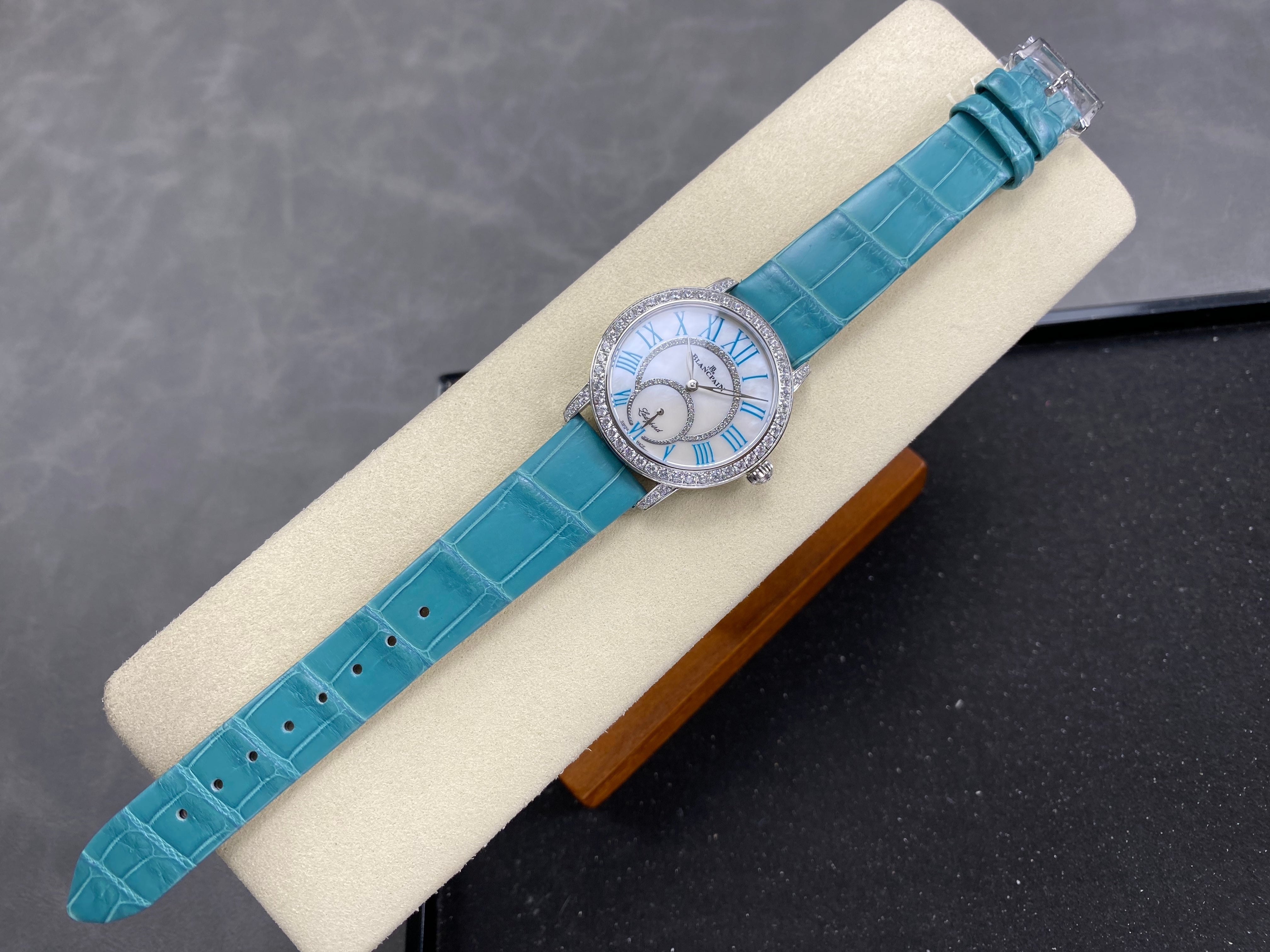 Blancpain's Ladybird 35mm White Blue Dial Diamond Bezel Leather