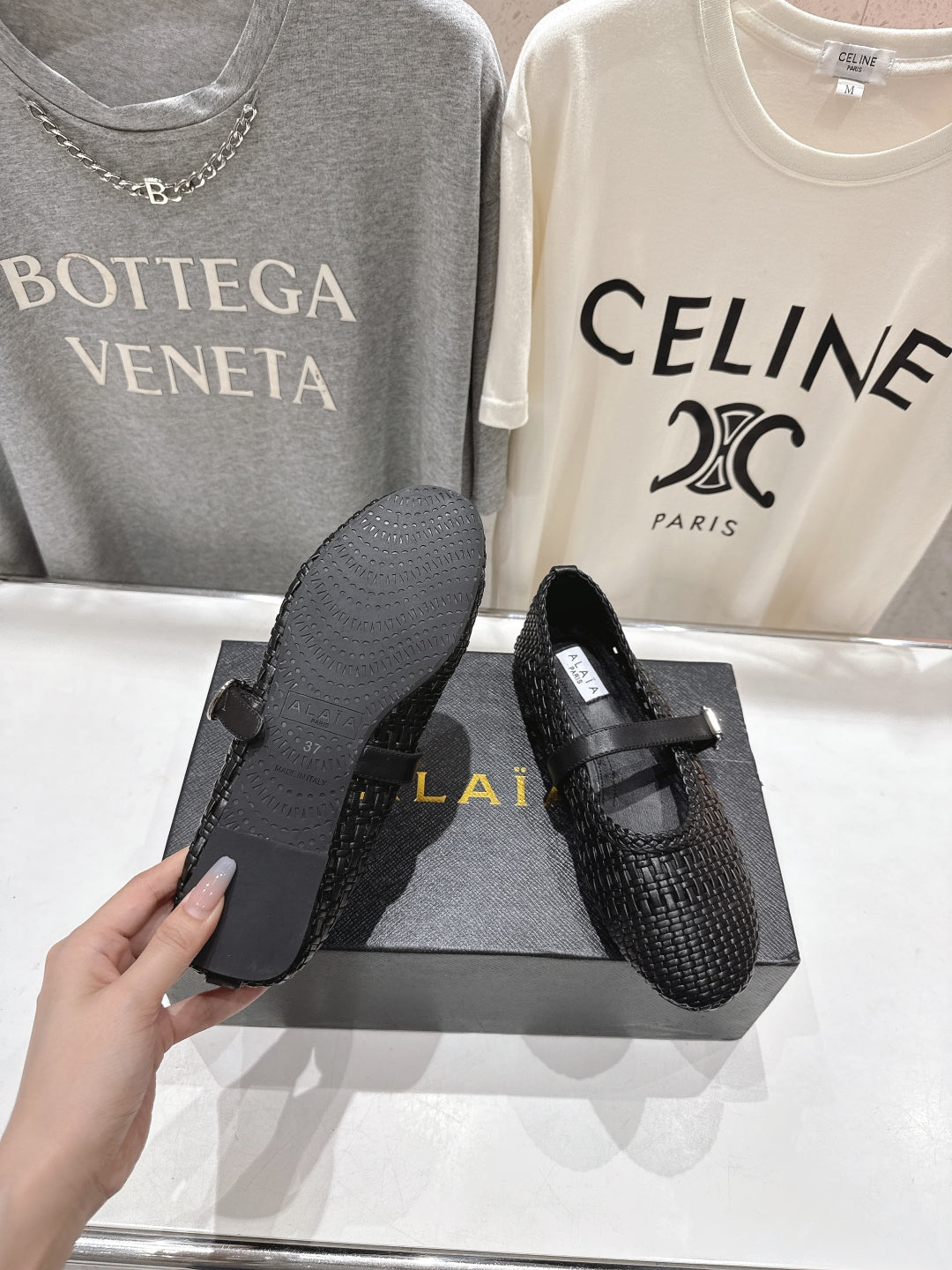 ALAIA MARY JANE FLATS black woven calfskin pattent