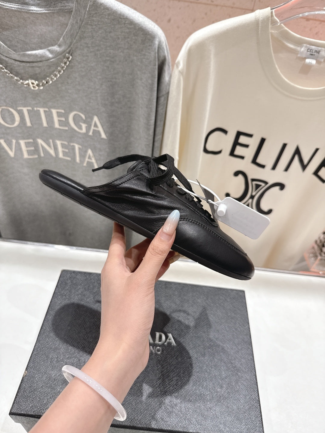 Prada 25s mule black sheepskin 535499