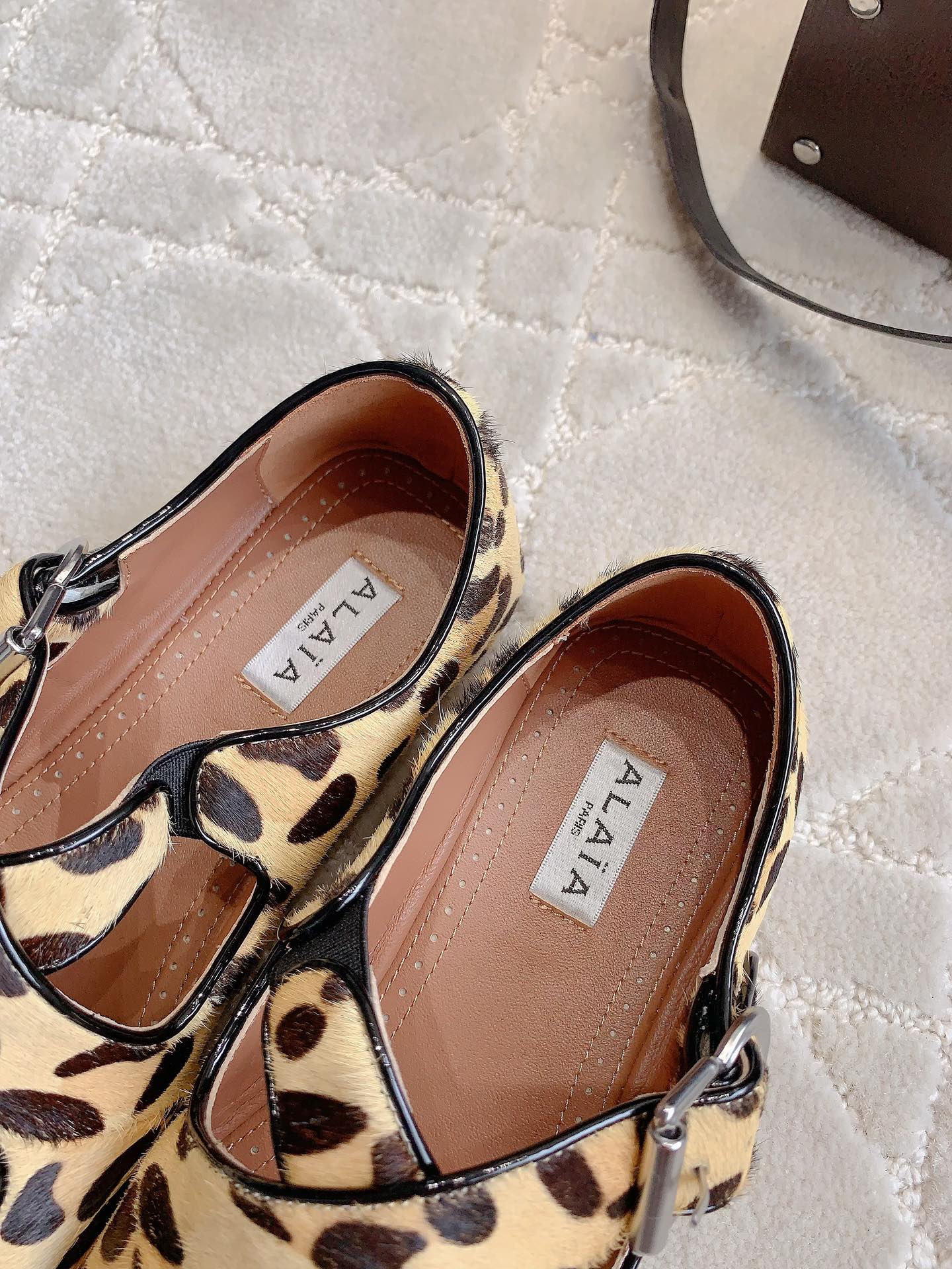 ALAIA CRISS CROSS BALLET FLAT IN LEOPARD LAMBSKIN WITH SILVER HARDWARE