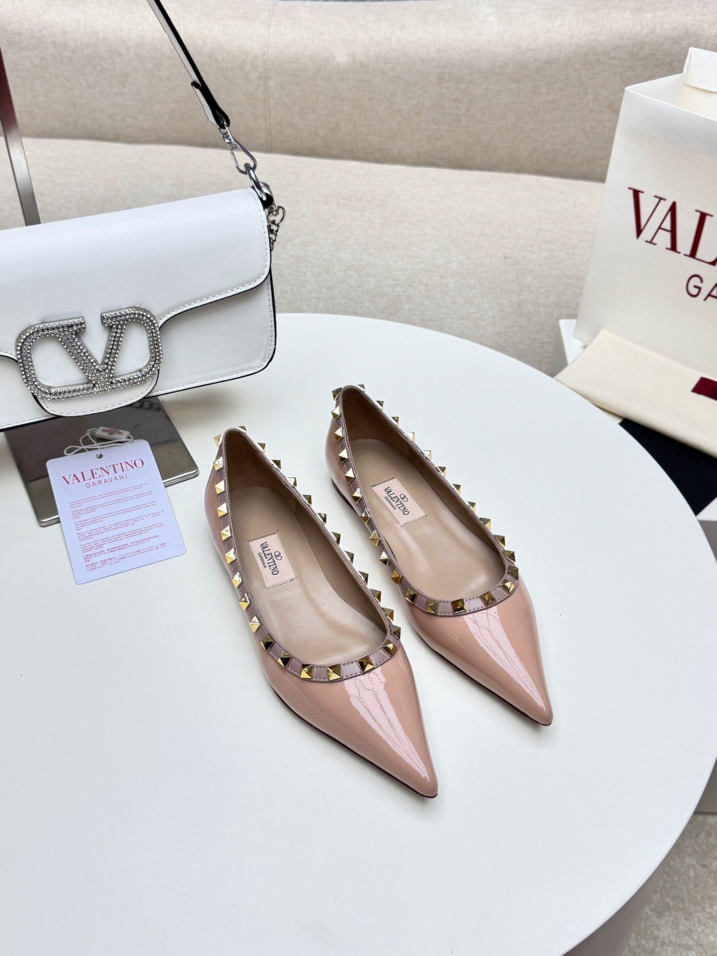ROCKSTUD FLAT PUMP IN NUDE TAN CALFSKIN