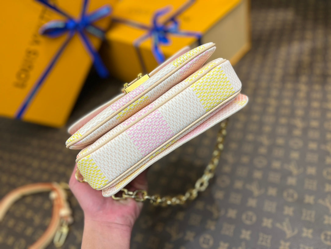 pochette metis east west 21.5 peach damier coasted canvas