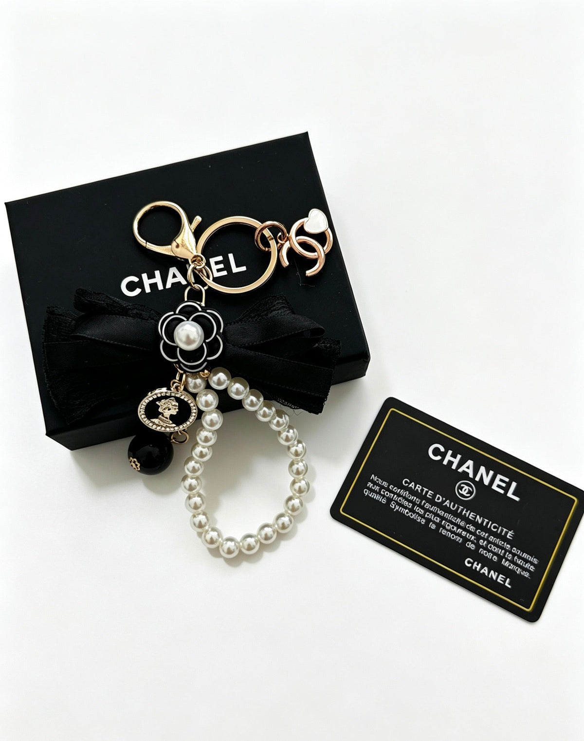 Chanel Black Bow Pearls Charm