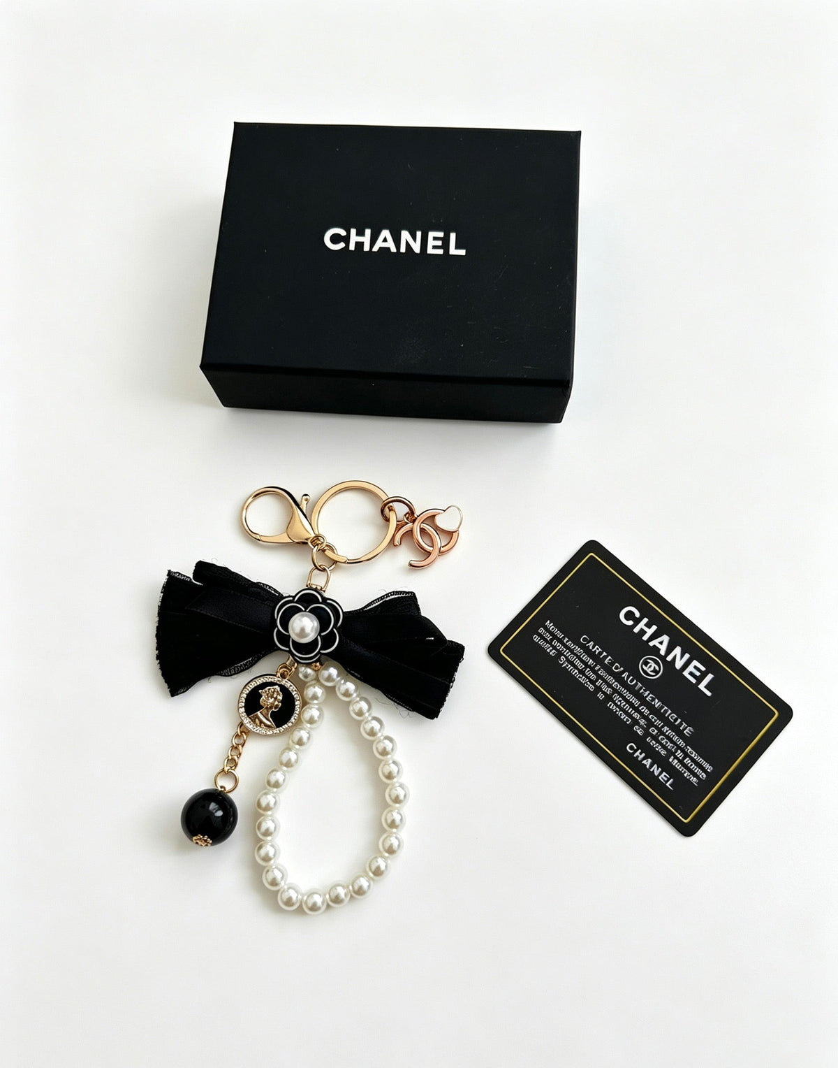 Chanel Black Bow Pearls Charm