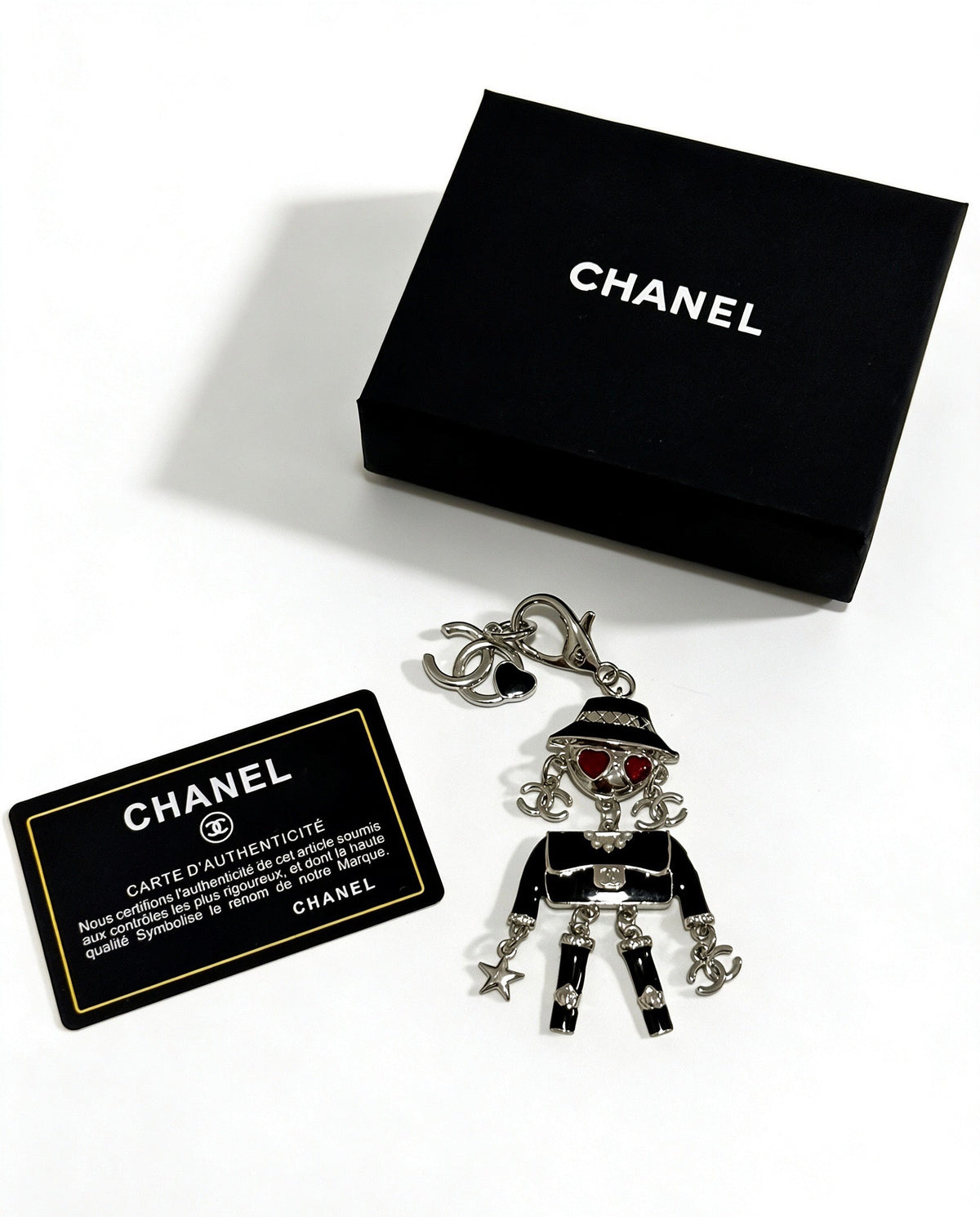 Chanel Black Silver Doll Charm