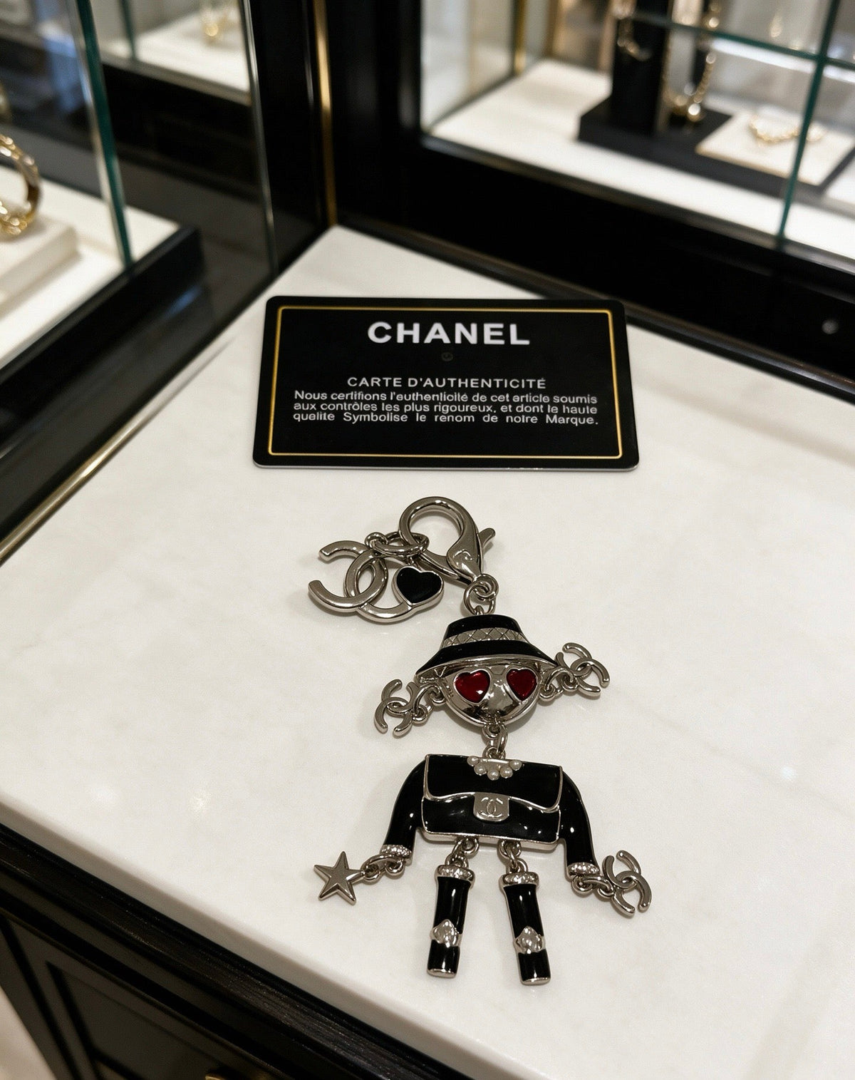 Chanel Black Silver Doll Charm