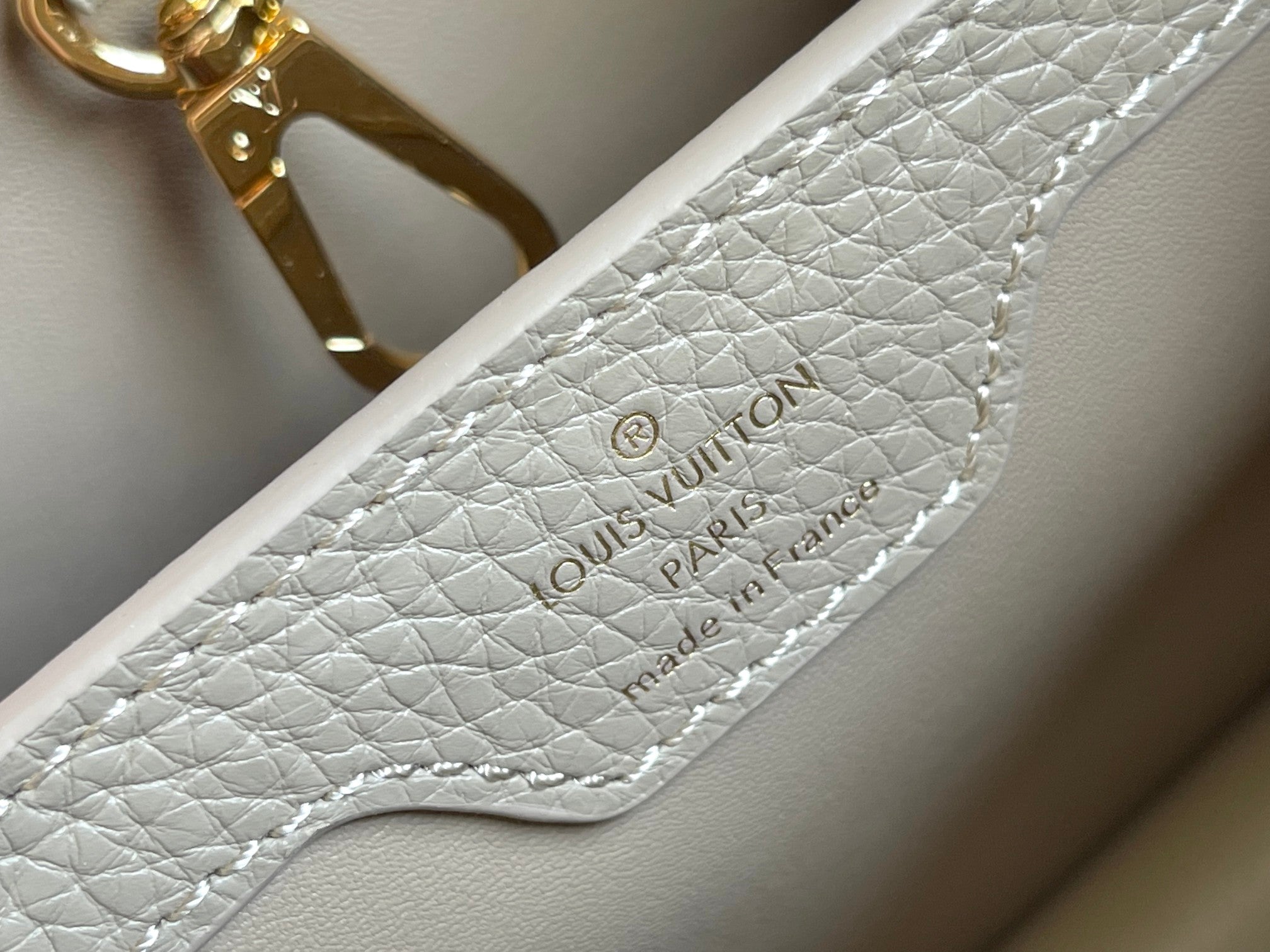 CAPUCINES BB 27 DARK BEIGE TAURILLON GOLD HARDWARE