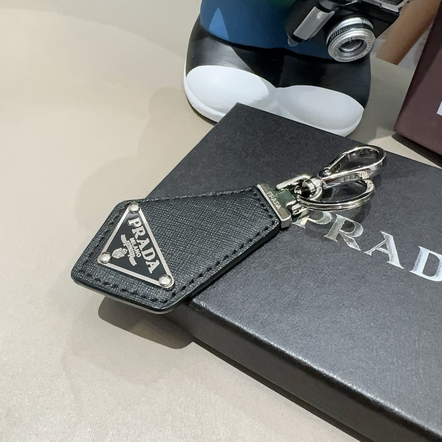 Prada Triangular Logo Charm 389051