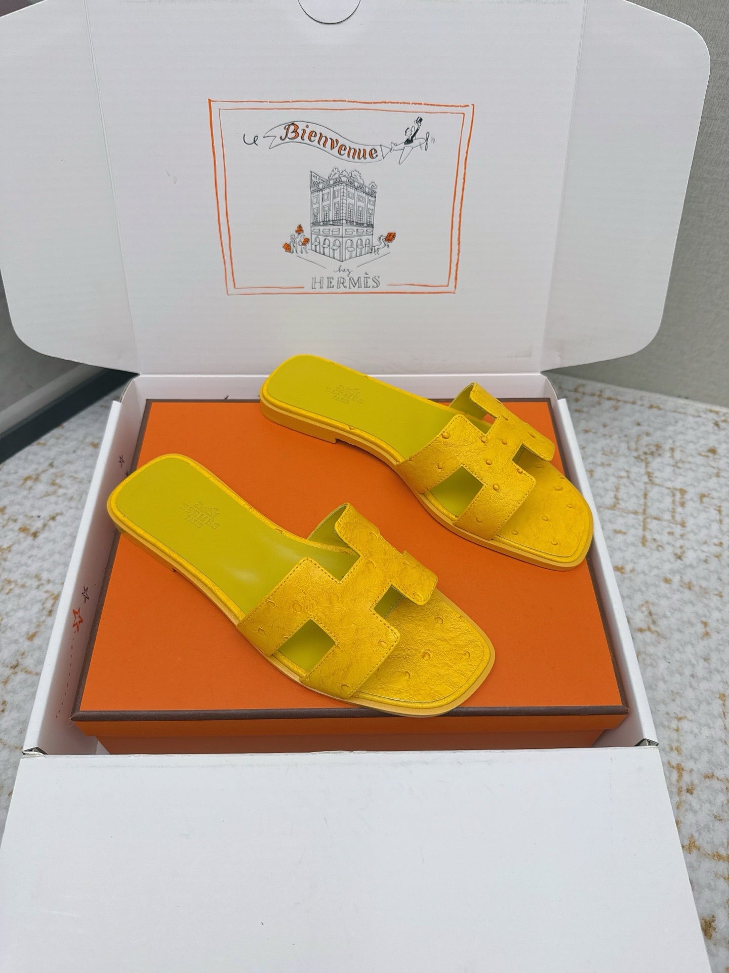 HM 26ss Oran Sandals Yellow Ostrich Leather 625090