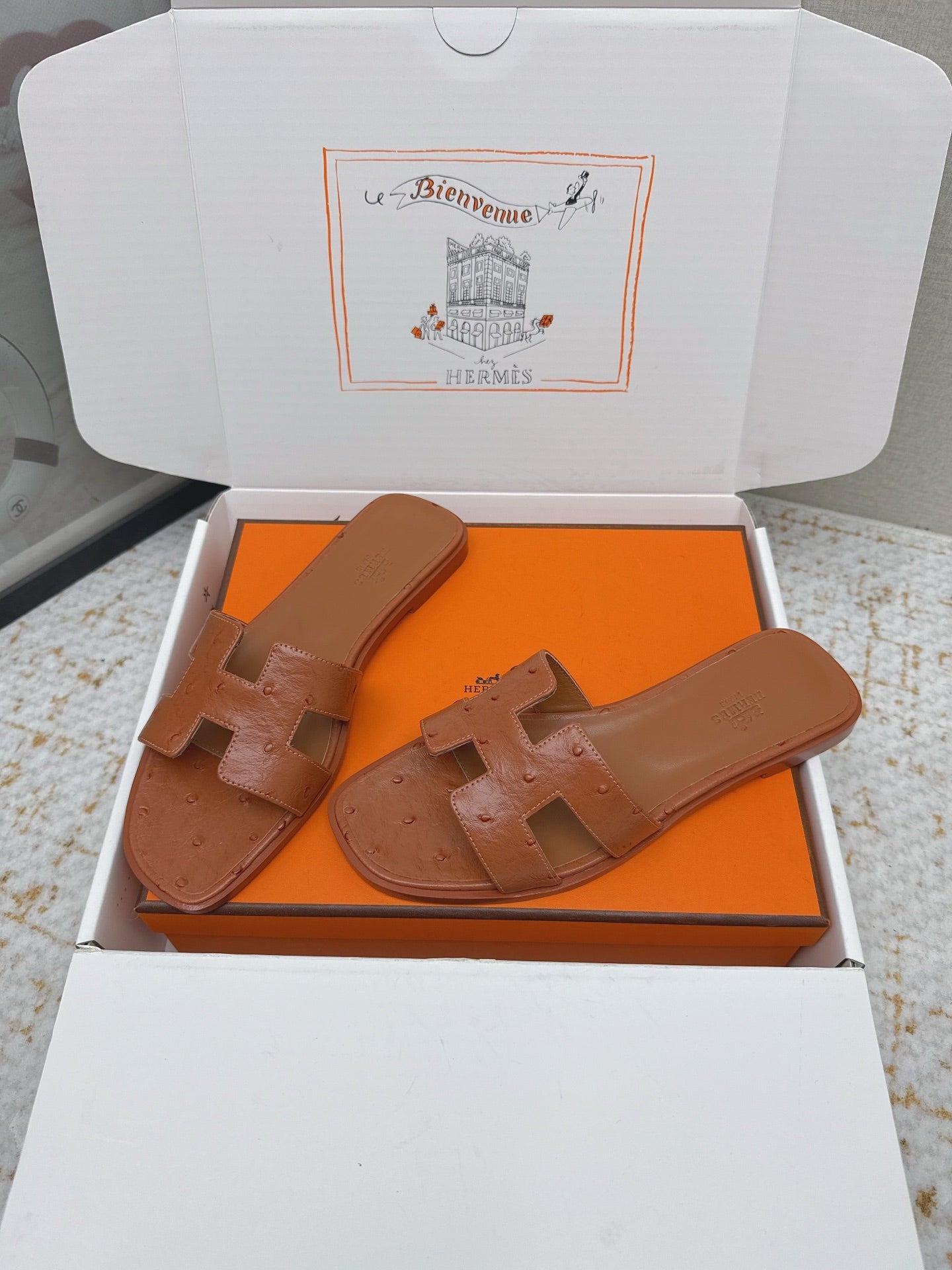 HM 26ss Oran Sandals Brown Ostrich Leather 625092