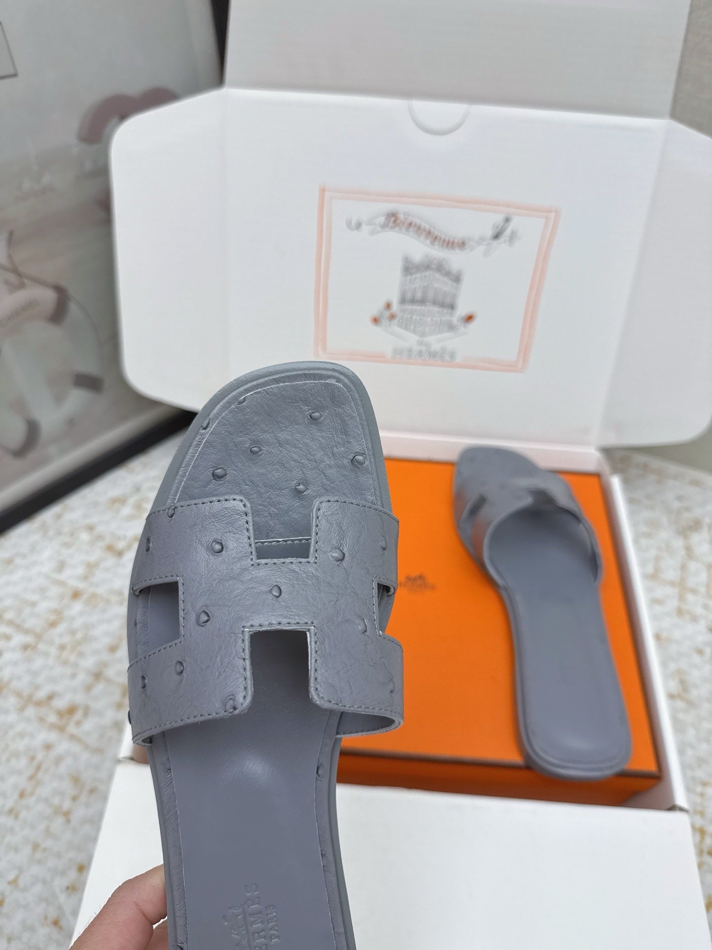 HM 26ss Oran Sandals Cool Grey Ostrich Leather 625098
