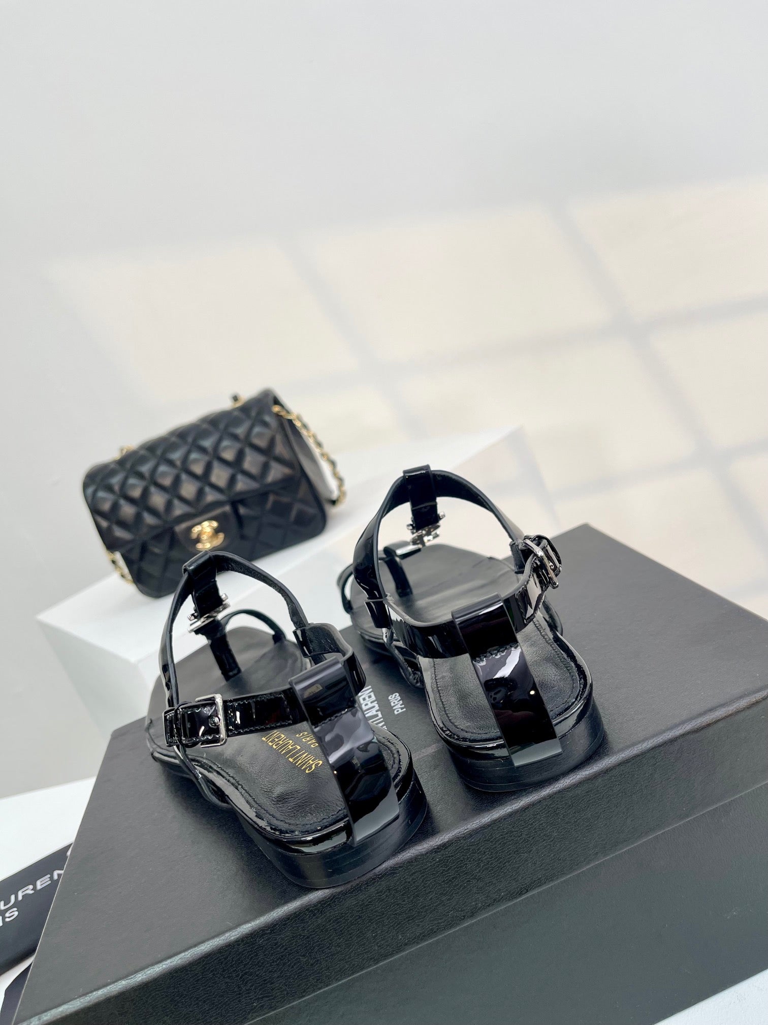 SL CASSANDRA ONE SANDAL FLAT BLACK CALFSKIN