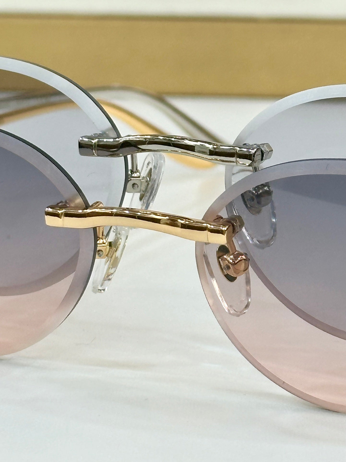 PANTHÈRE RIMLESS ROUND FRAME SUNGLASSES CT0504S IN METAL