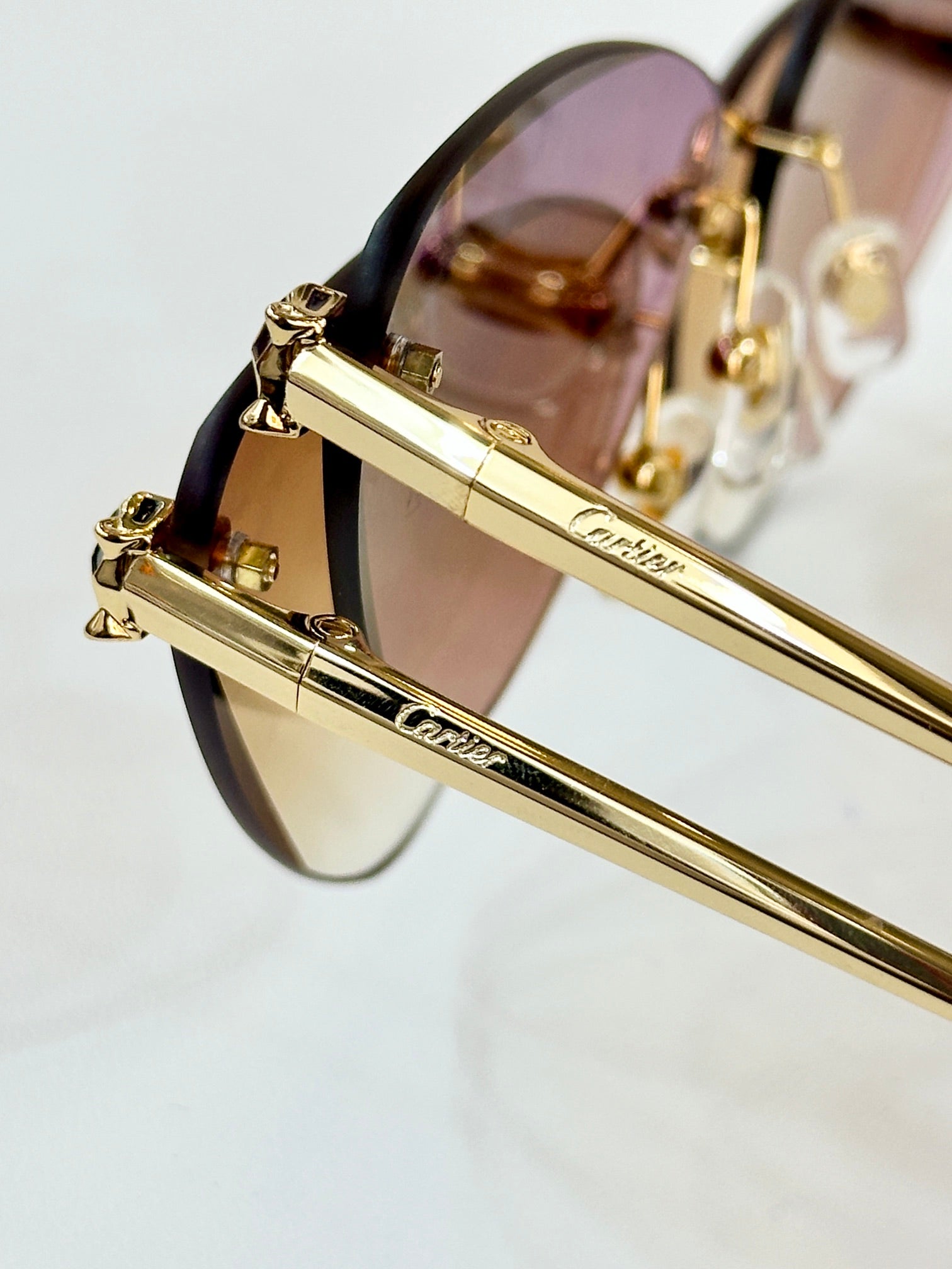 PANTHÈRE RIMLESS TRIANGLE FRAME SUNGLASSES  570457 IN METAL