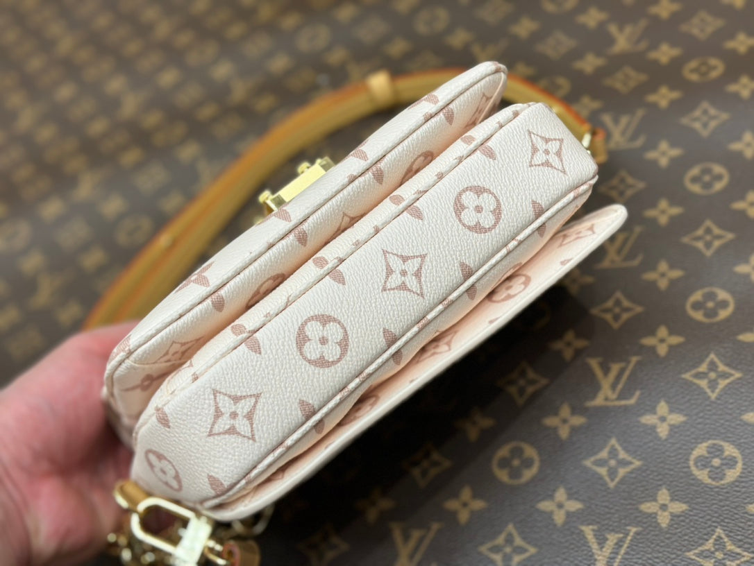 pochette metis east west 21.5 monogram dune canvas