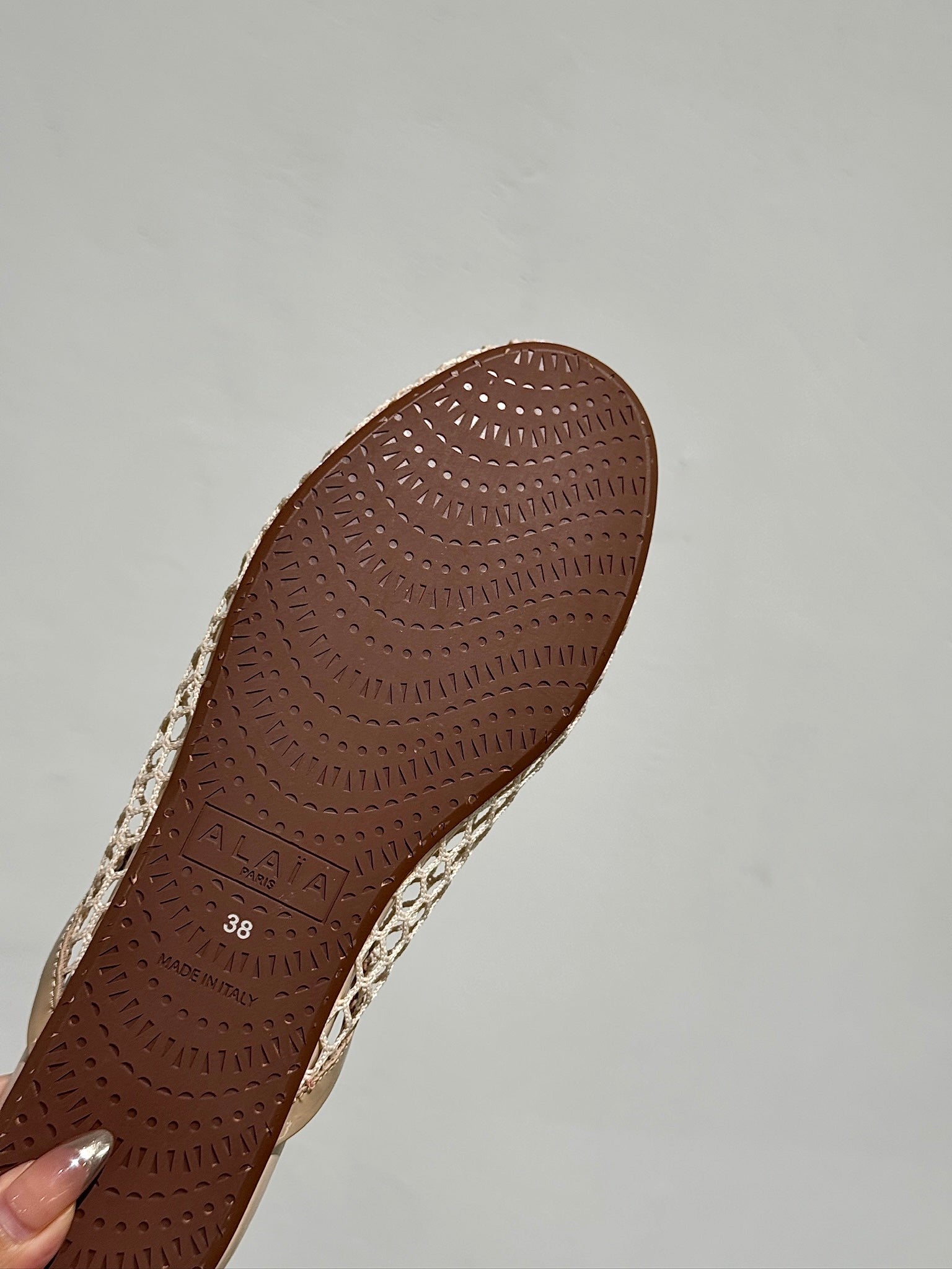 ALAIA FLAT MULES IN BEIGE MESH FISHNET