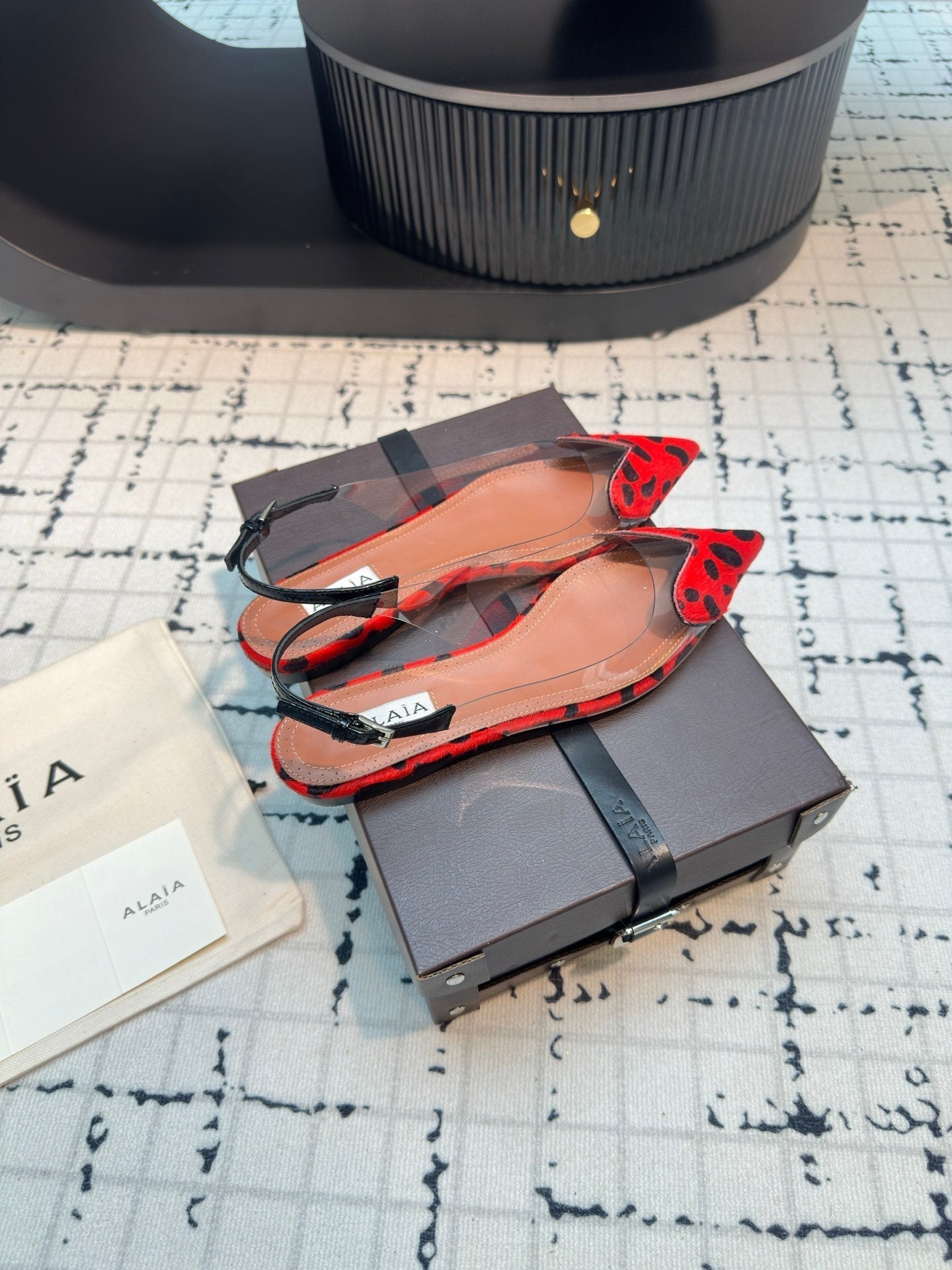 ALAIA FLAT SLINGBACK IN CHERRY RED MIX BLACK PATENT CALFSKIN AND FILM