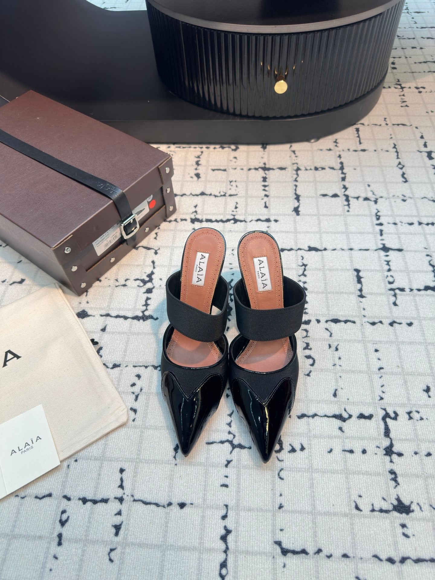 ALAIA HIGH HEEL 9 CM IN BLACK CALFSKIN