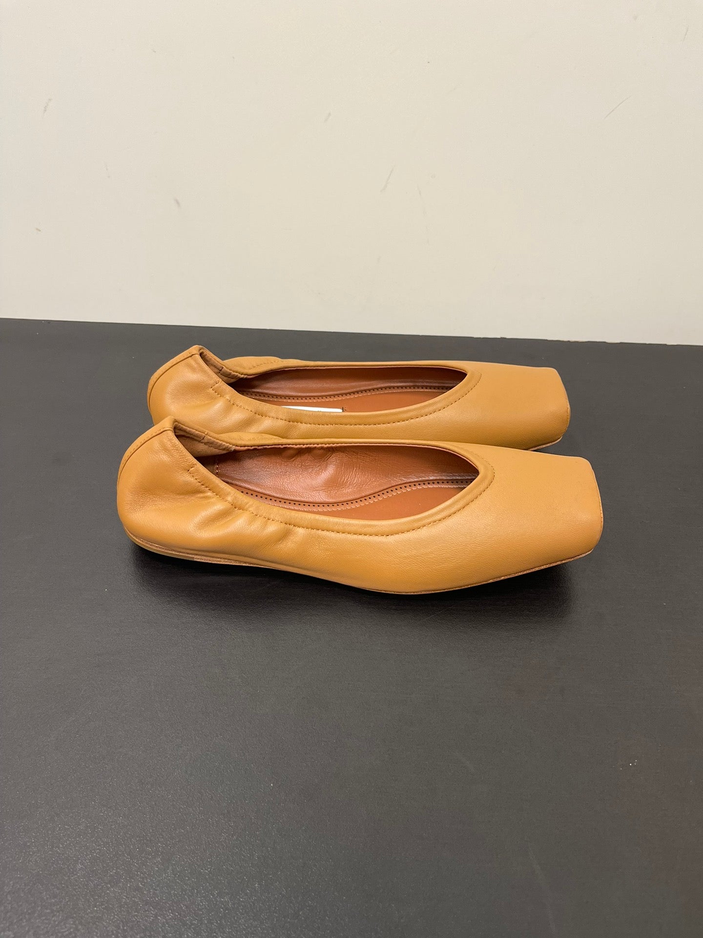 ALAIA BALLET FLATS IN COPPER BROWN SMOOTH CALFSKIN