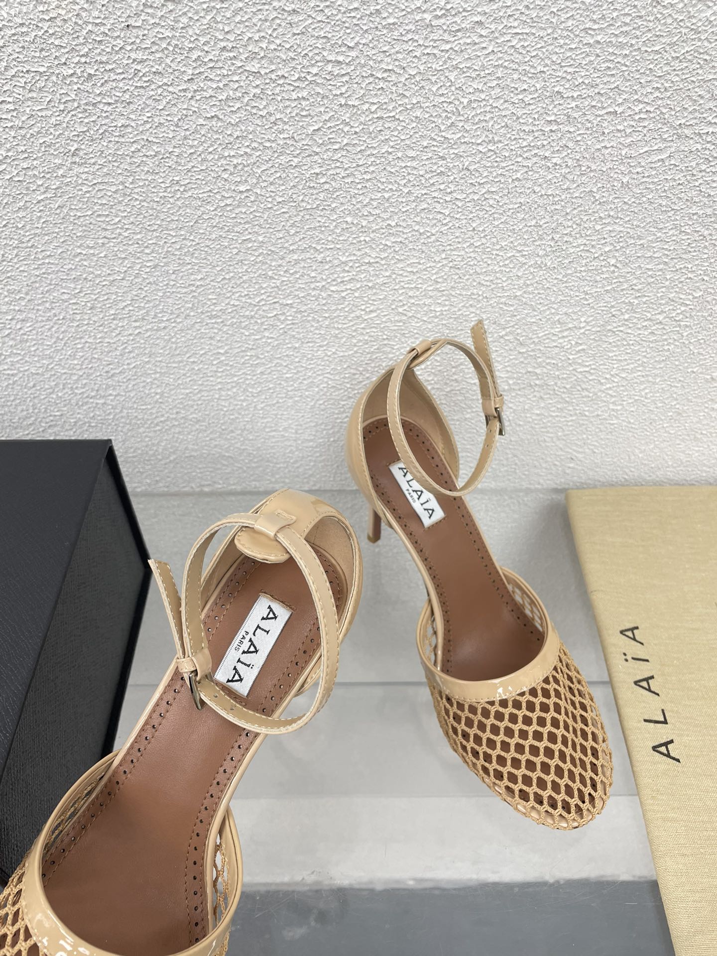 ALAIA HIGH FISHNET 9 CM PUMPS IN EGG NOG MESH