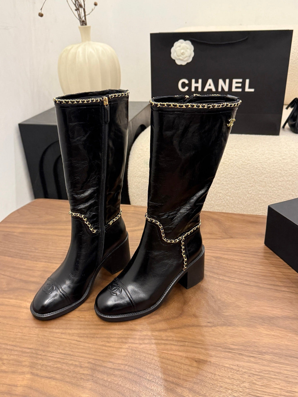 Chanel 2026 Crumped Cap Toe Chain Boots 65mm Leather 173455