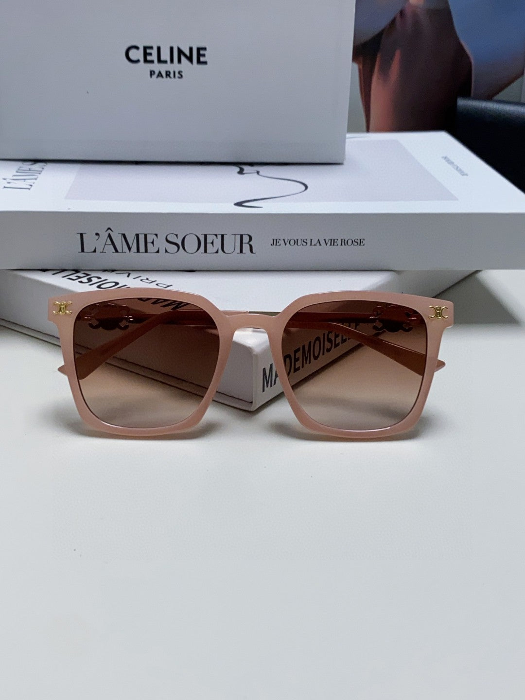 TRIOMPHE SUNGLASS 497815 IN PINK CLEAR METAL