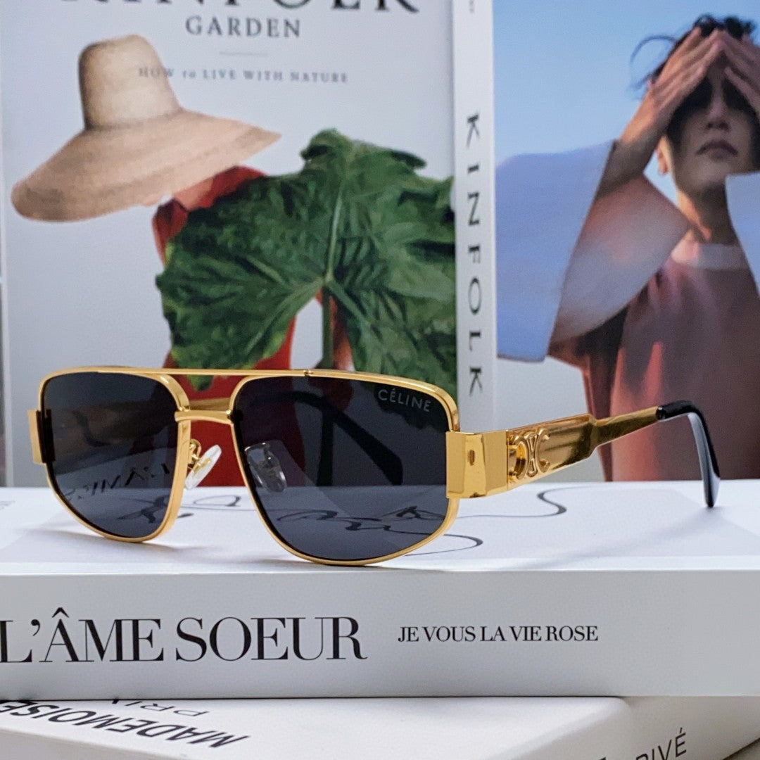 TRIOMPHE SUNGLASS 513000 IN GOLD METAL BLACK LENSES