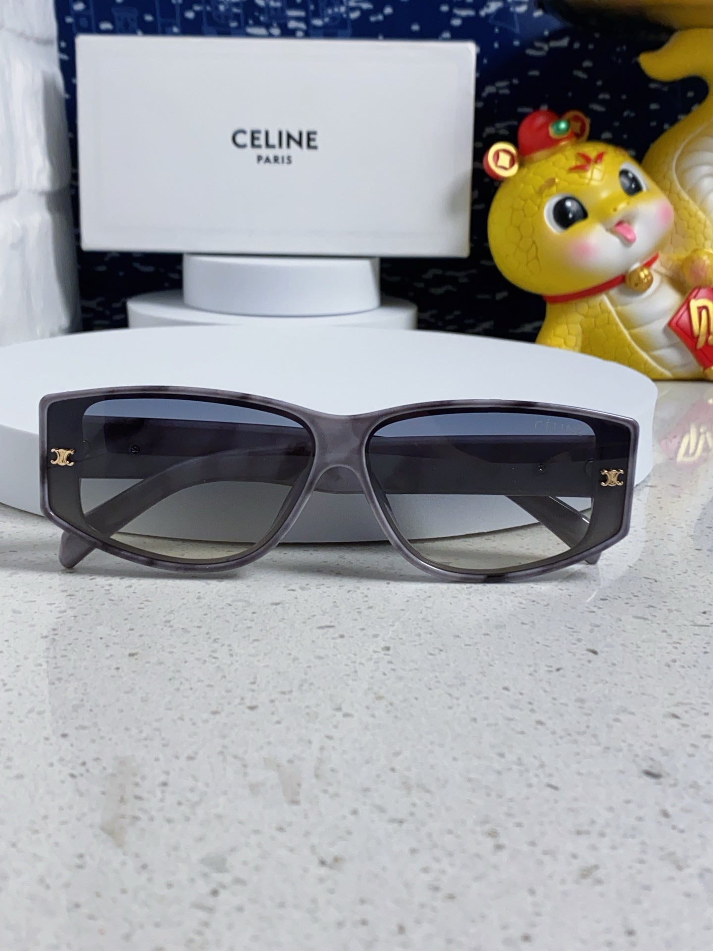 TRIOMPHE SUNGLASS 566217 IN MARBLED EFFECT ACETATE