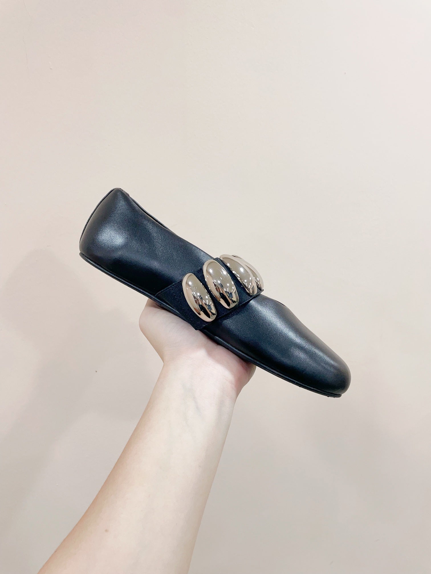 ALAIA TRIBALE BALLET FLATS IN BLACK LAMBSKIN