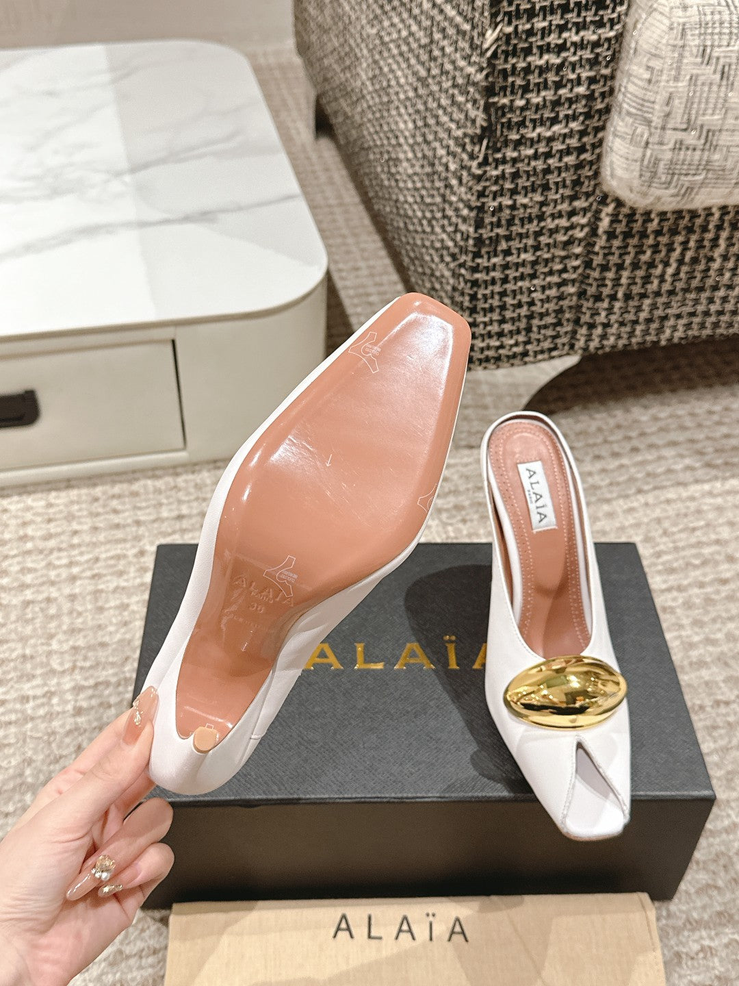 ALAIA SPIKE JEWEL MULES IN WHITE CALFSKIN WITH GOLD HARDWARE
