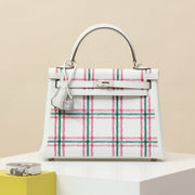 High-end Hermes 2026 Retourne Tartan Kelly Bag 25cm Swift Calfskin