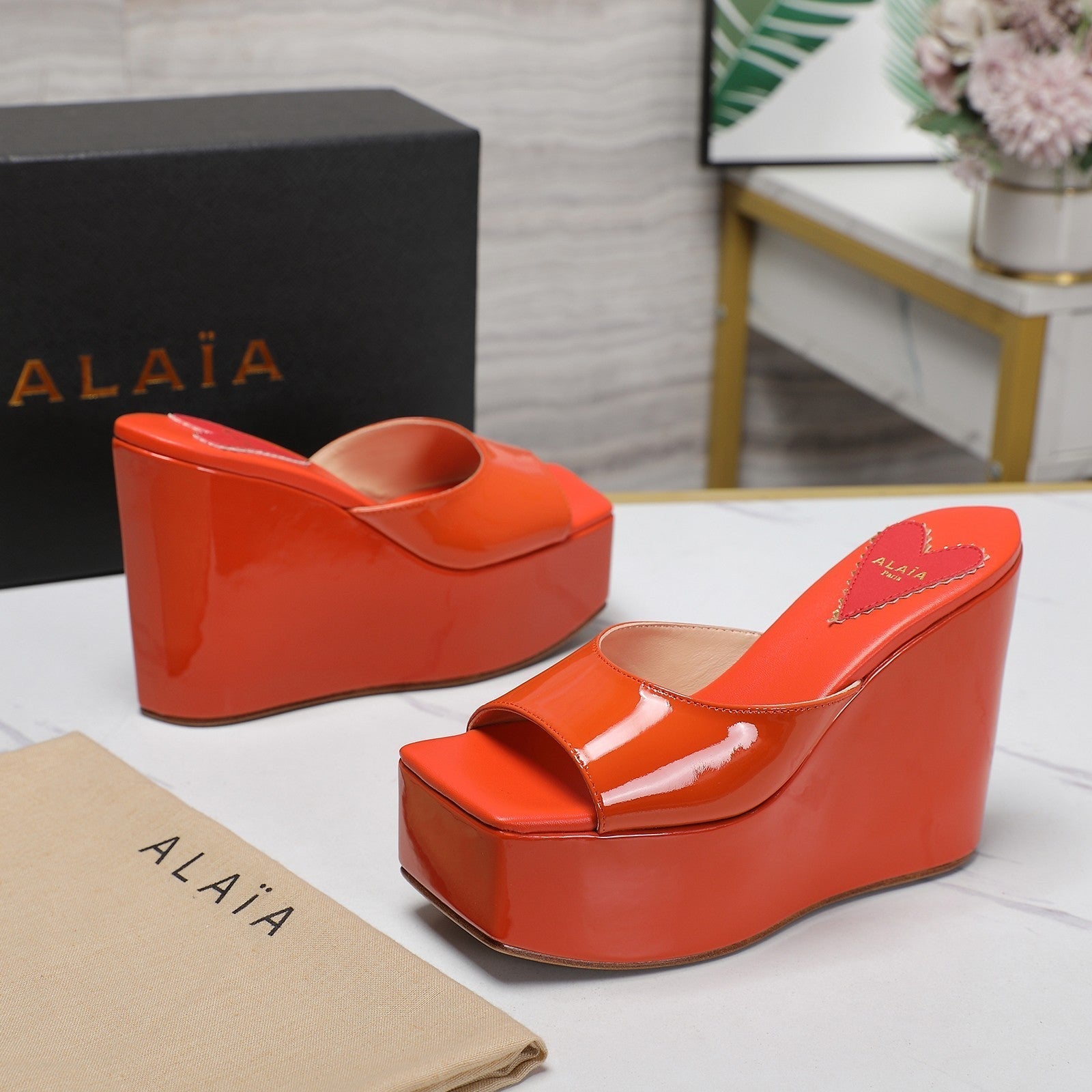 ALAIA PLATFORM WEDGE IN VIVID ORANGE LAMBSKIN WITH RED HEART
