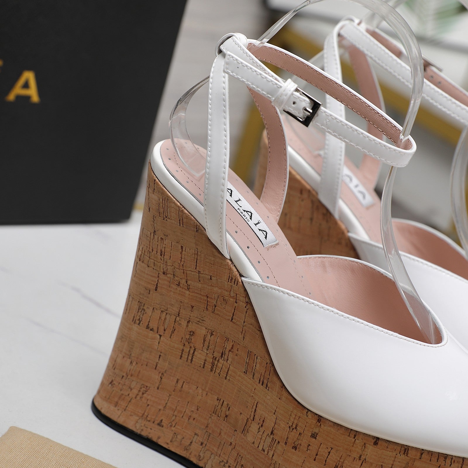 ALAIA WEDGE SANDAL IN WHITE GLOSSY CALFSKIN AND BEIGE RUBBER