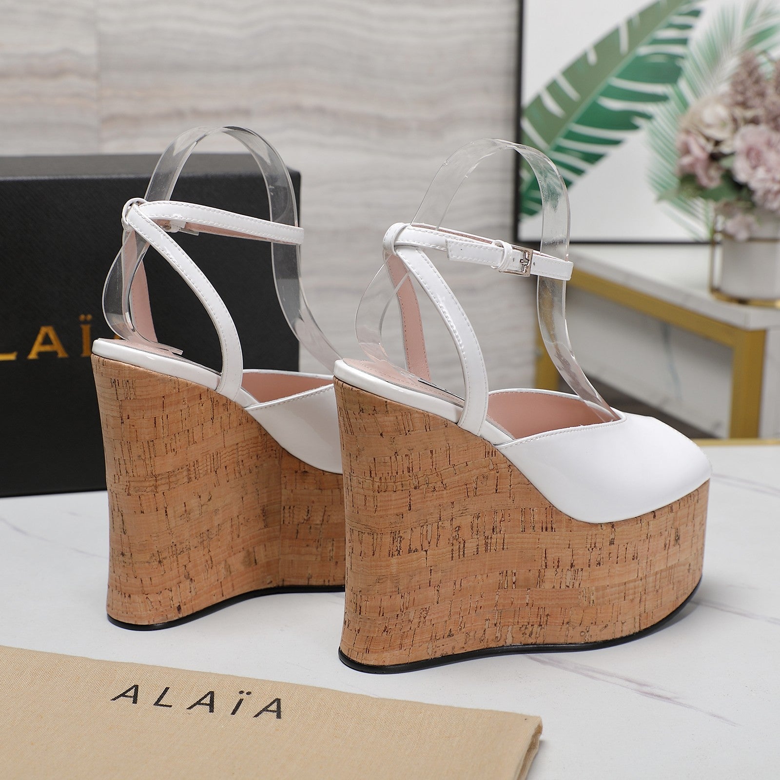 ALAIA WEDGE SANDAL IN WHITE GLOSSY CALFSKIN AND BEIGE RUBBER